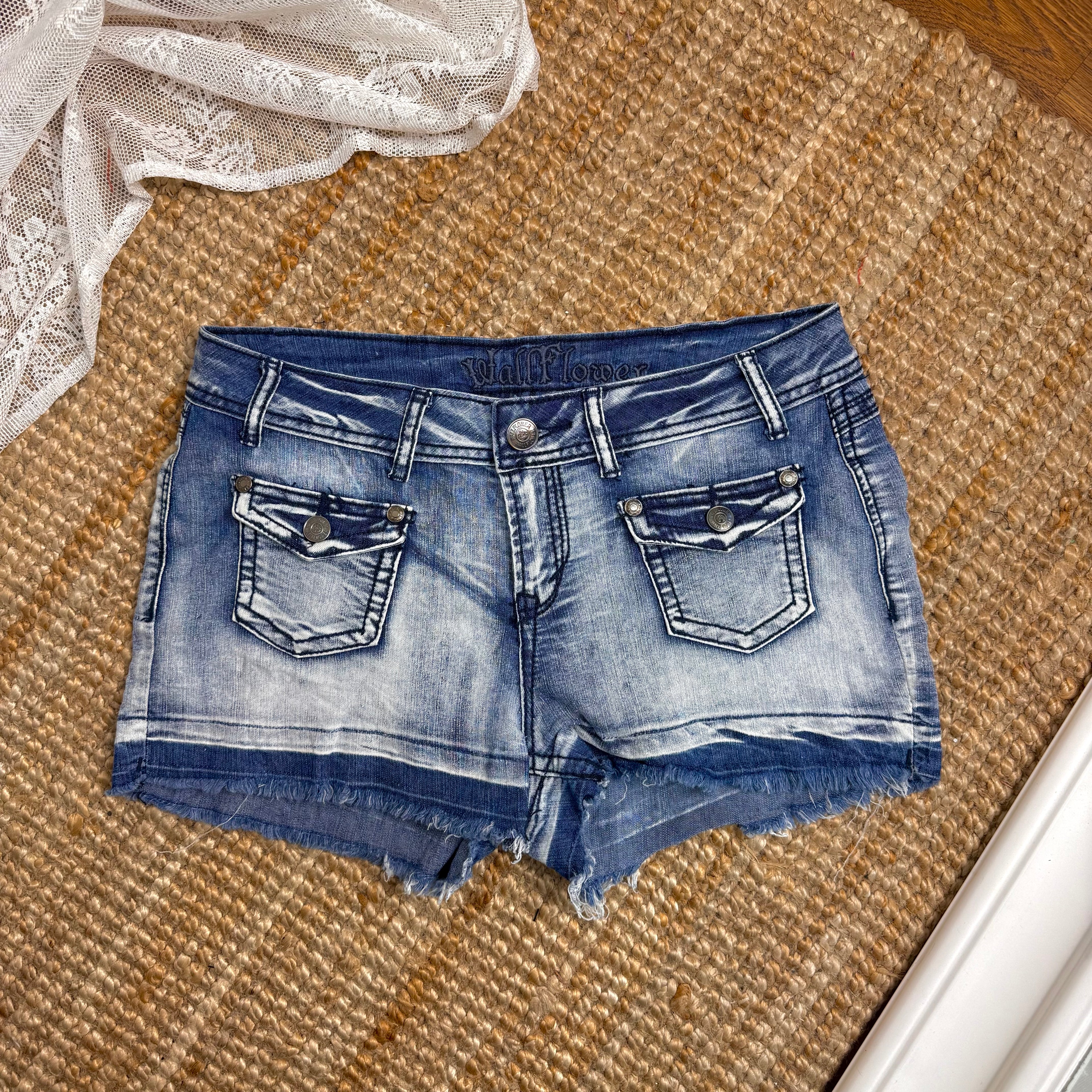 Blue denim studded mini shorts