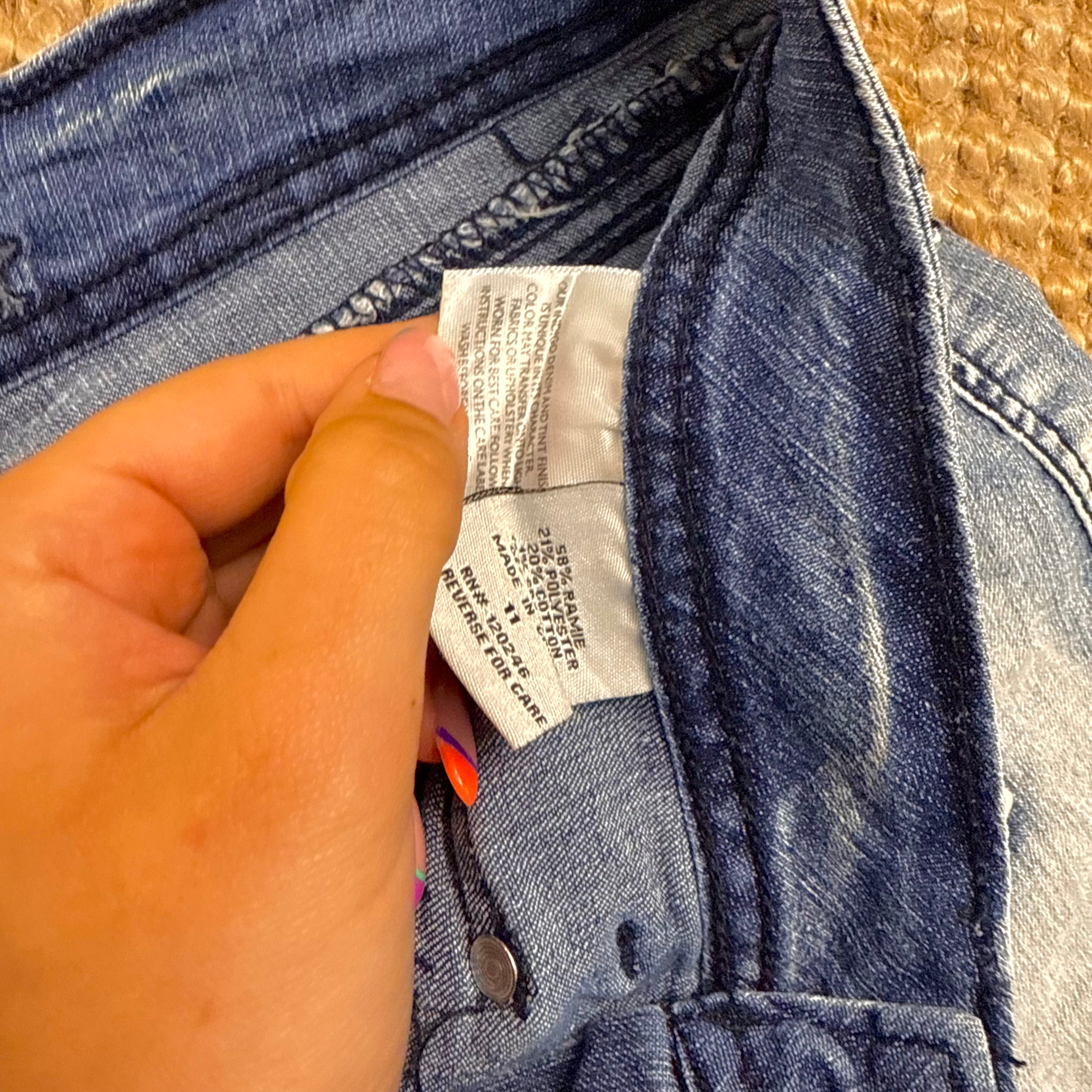 Blue denim studded mini shorts