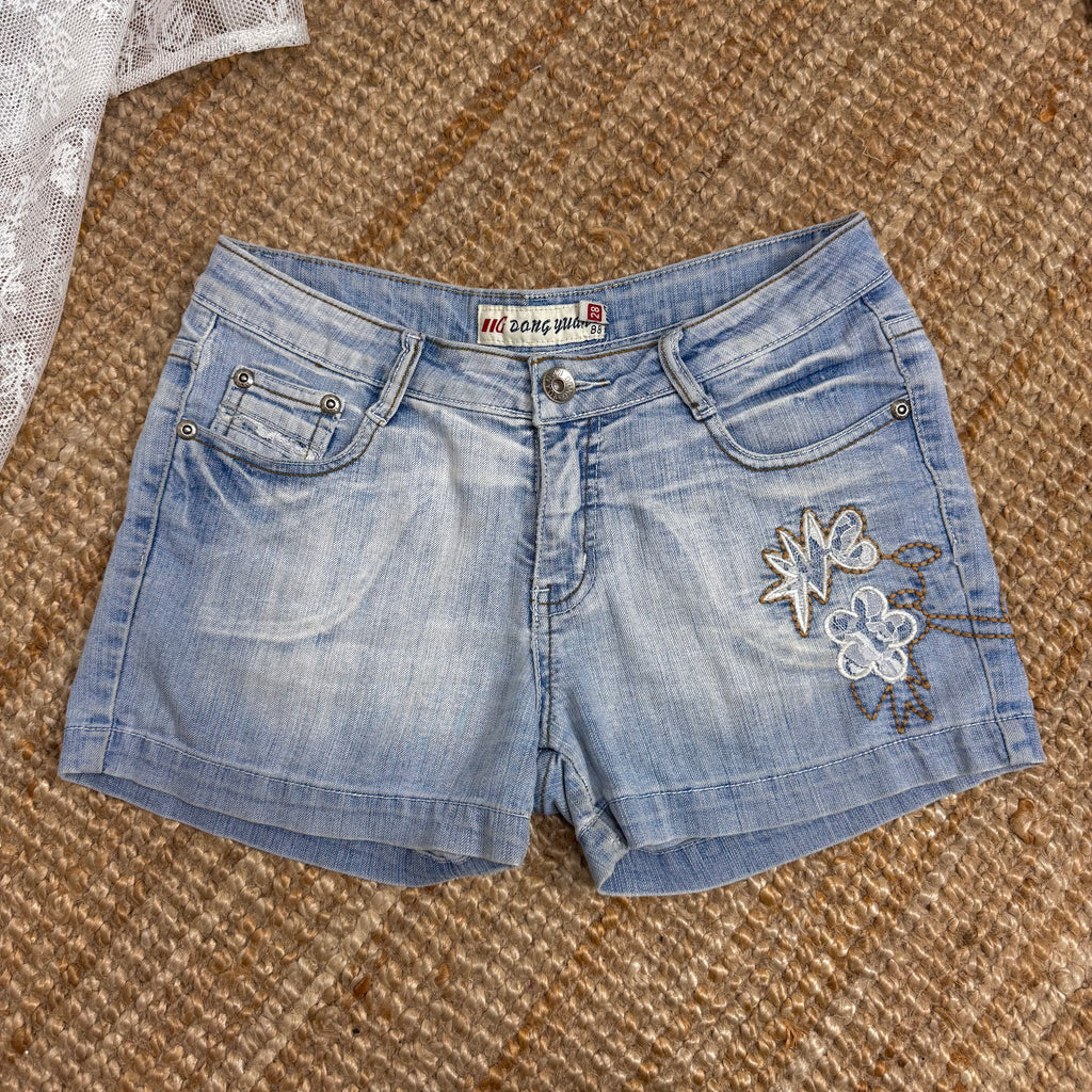 Blue denim shorts with embroidery detailing