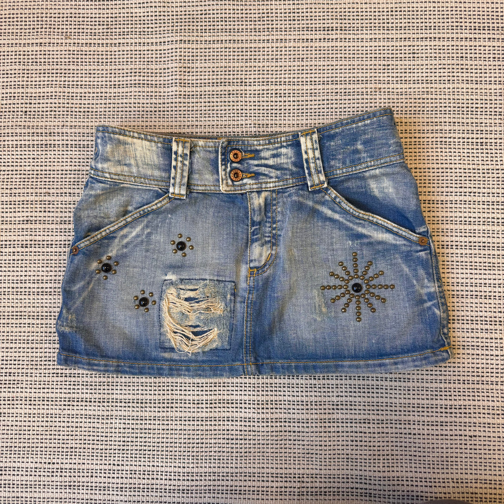 Blue denim distressed stuffed mini skirt