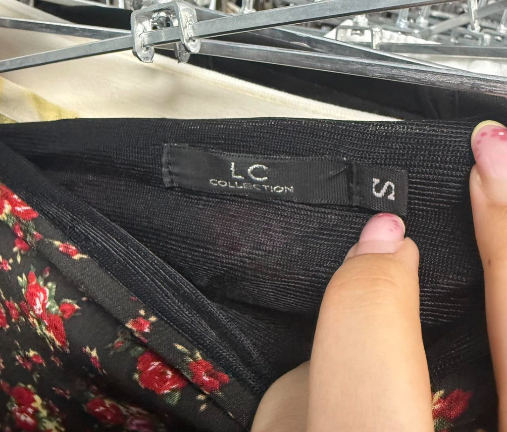 Black floral asymmetrical midi skirt