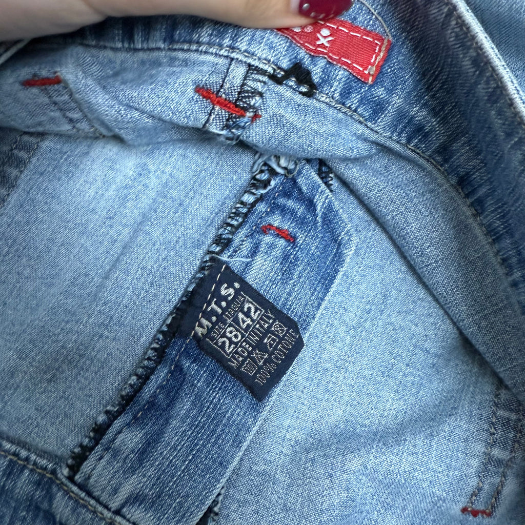 Light wash denim mini skirt with waistband detailing