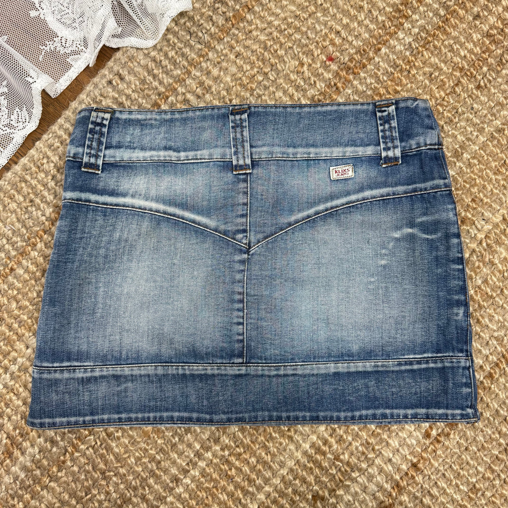 Blue washed denim mini skirt with button and zip detailing