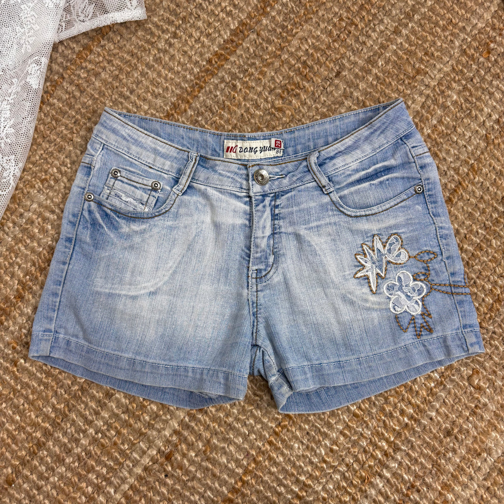 Blue denim shorts with embroidery detailing
