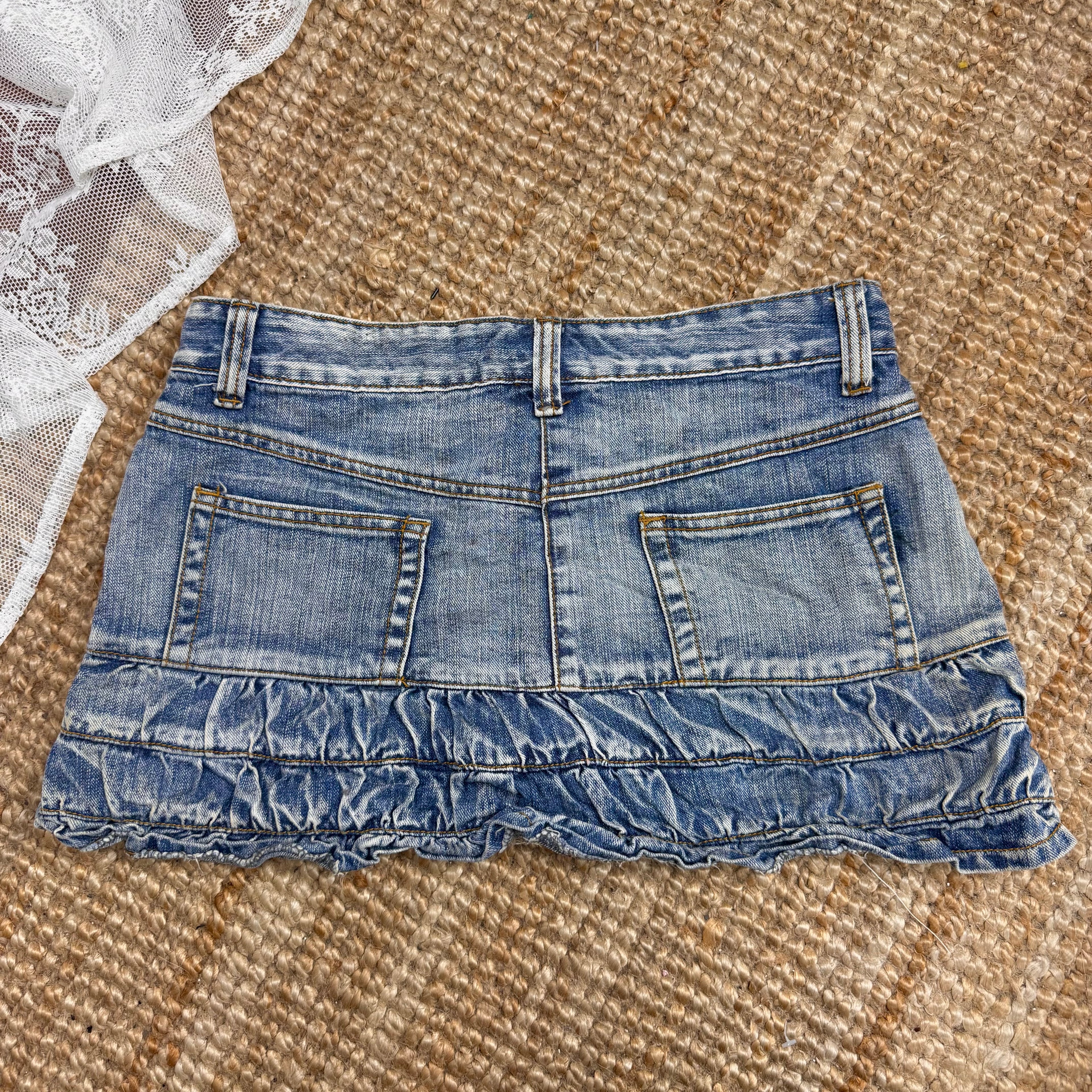 Blue denim low waisted ruffle mini skirt