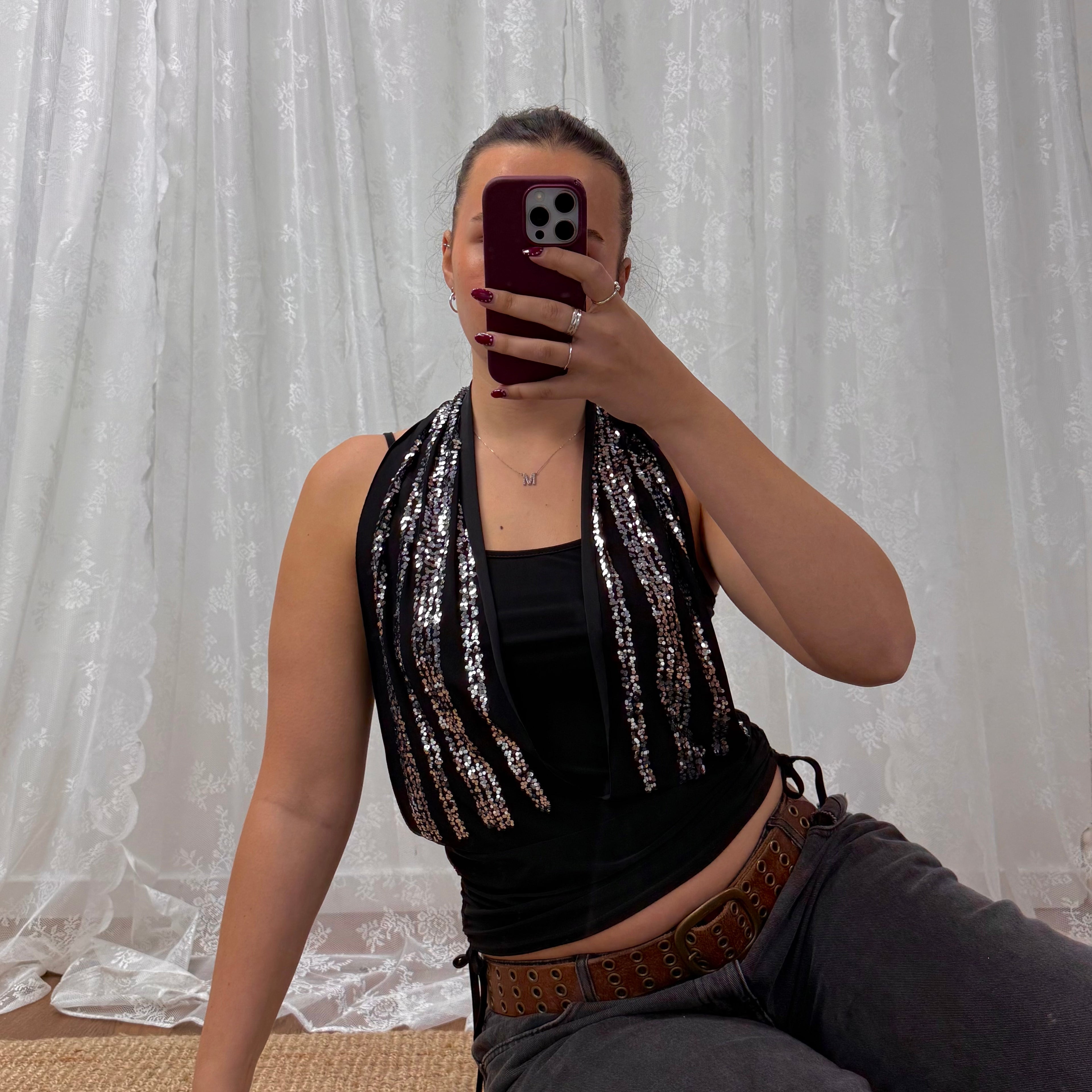 Black double layered glittery cowl neck top with tie around detail