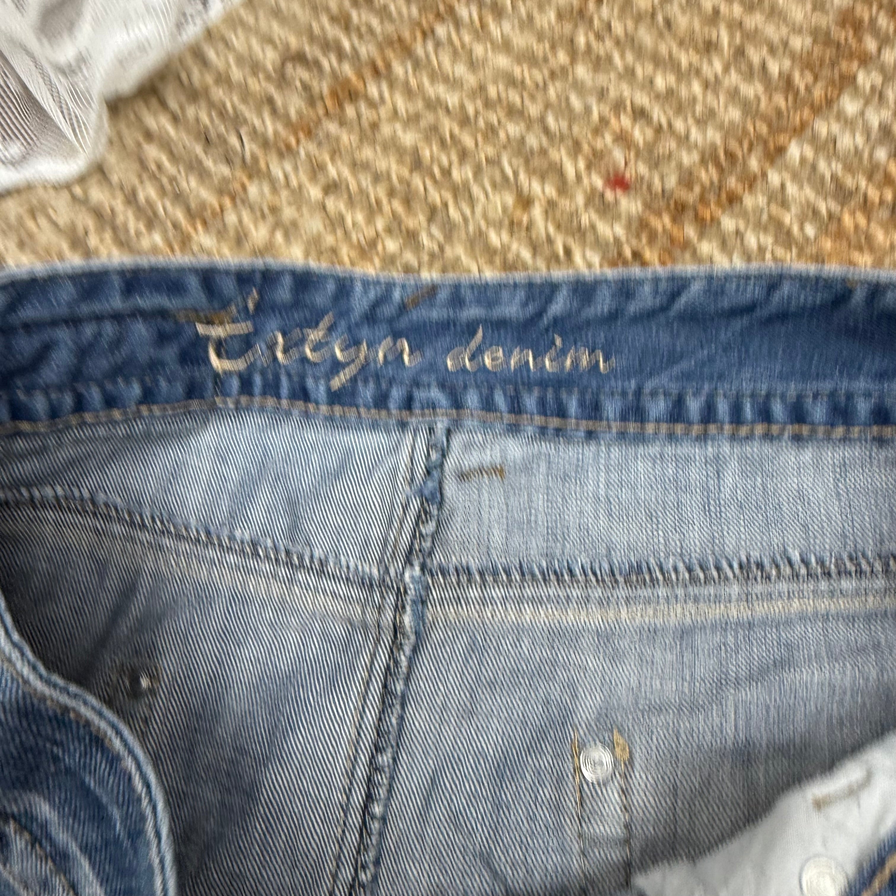 Blue denim Mini skirt with gem button detailing