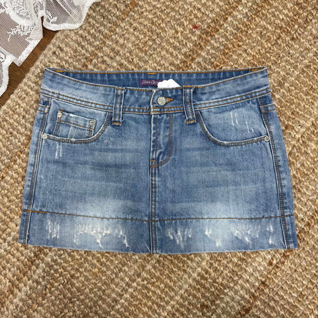 Light blue denim mini skirt with distressed detailing