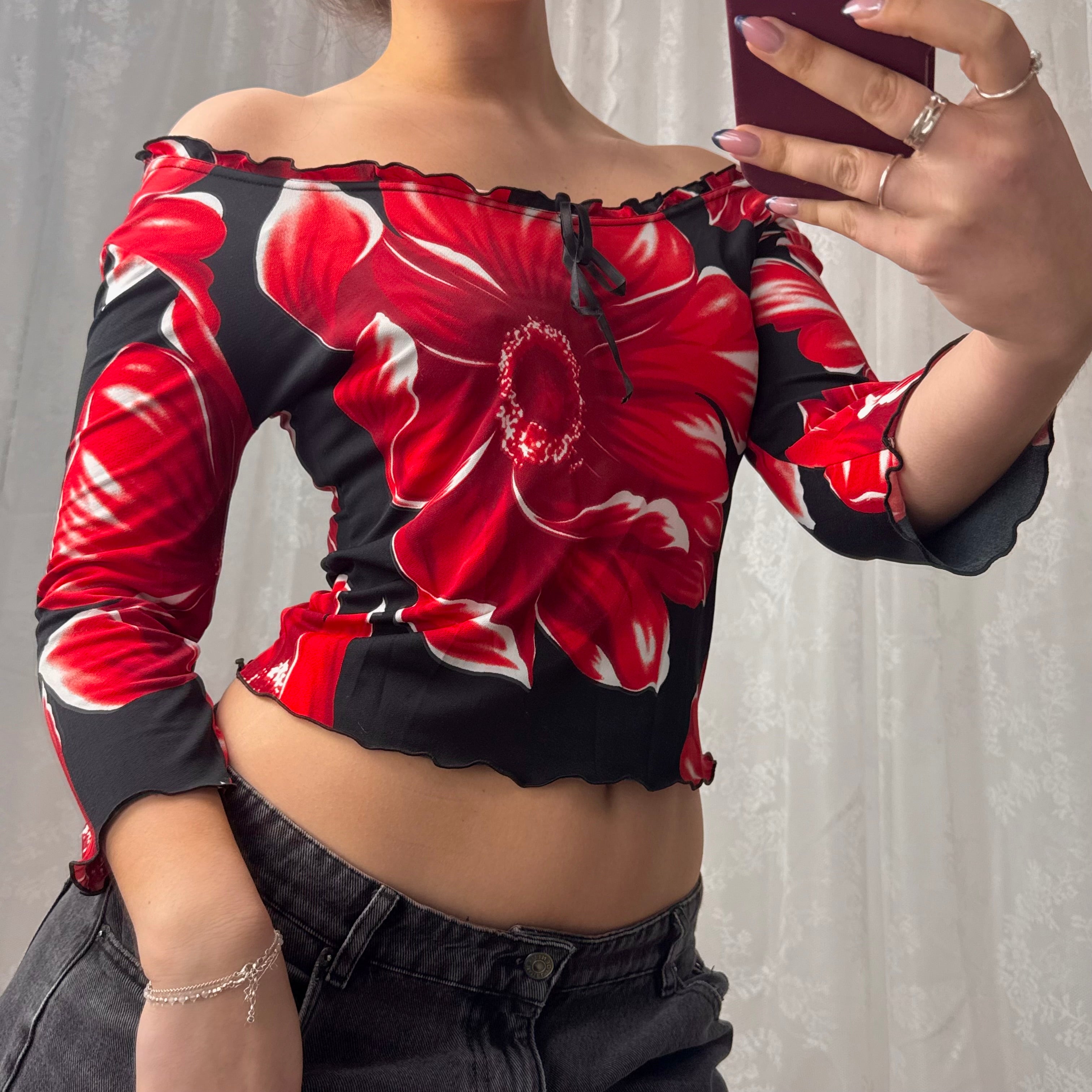 Red and black patterned off the shoulder top