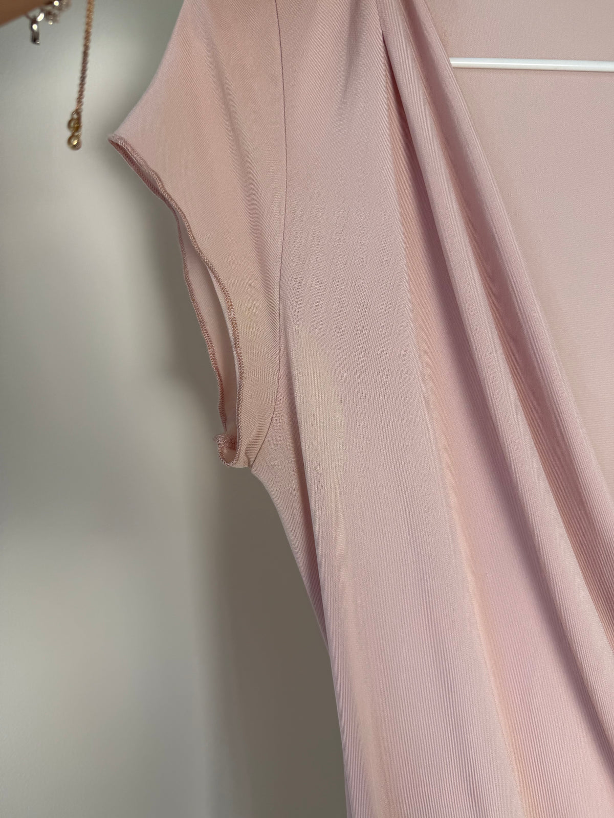 Pink wrapped slinky top