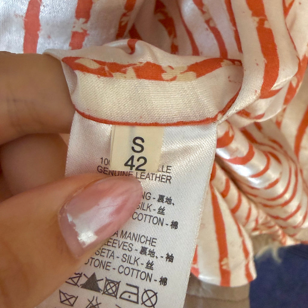 Beige leather button up jacket