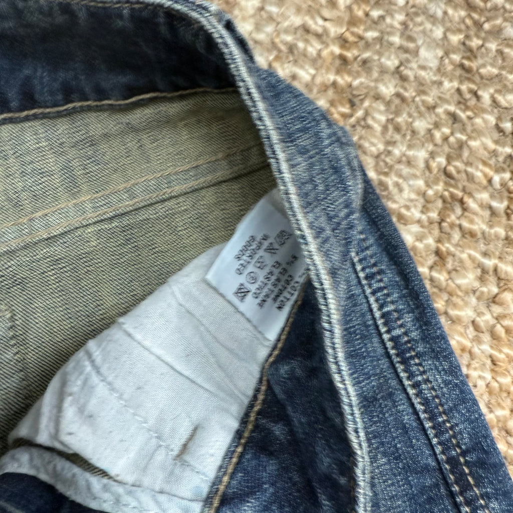 Blue denim mini skirt with black lace