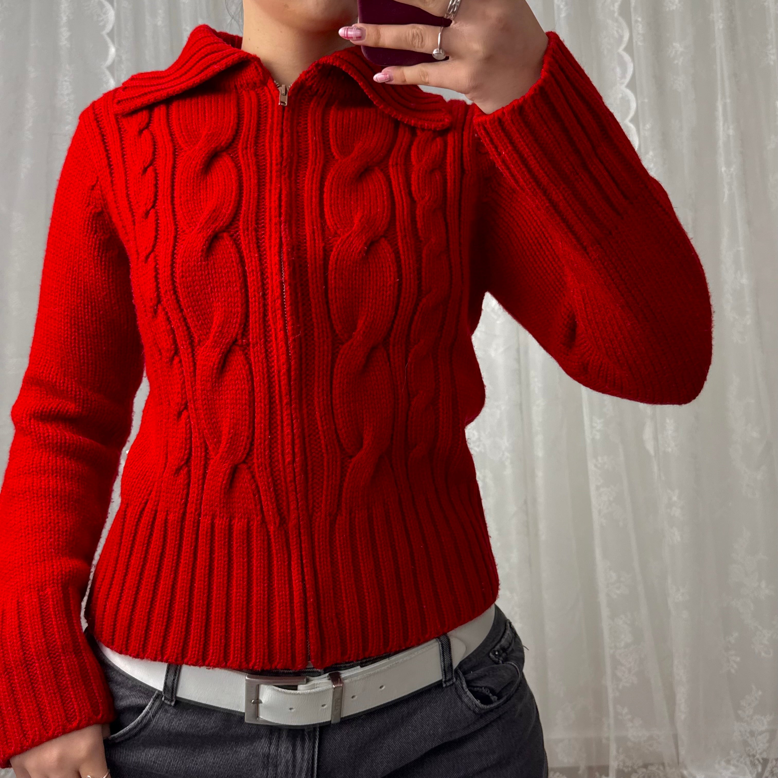 Red knitted zip up sweater