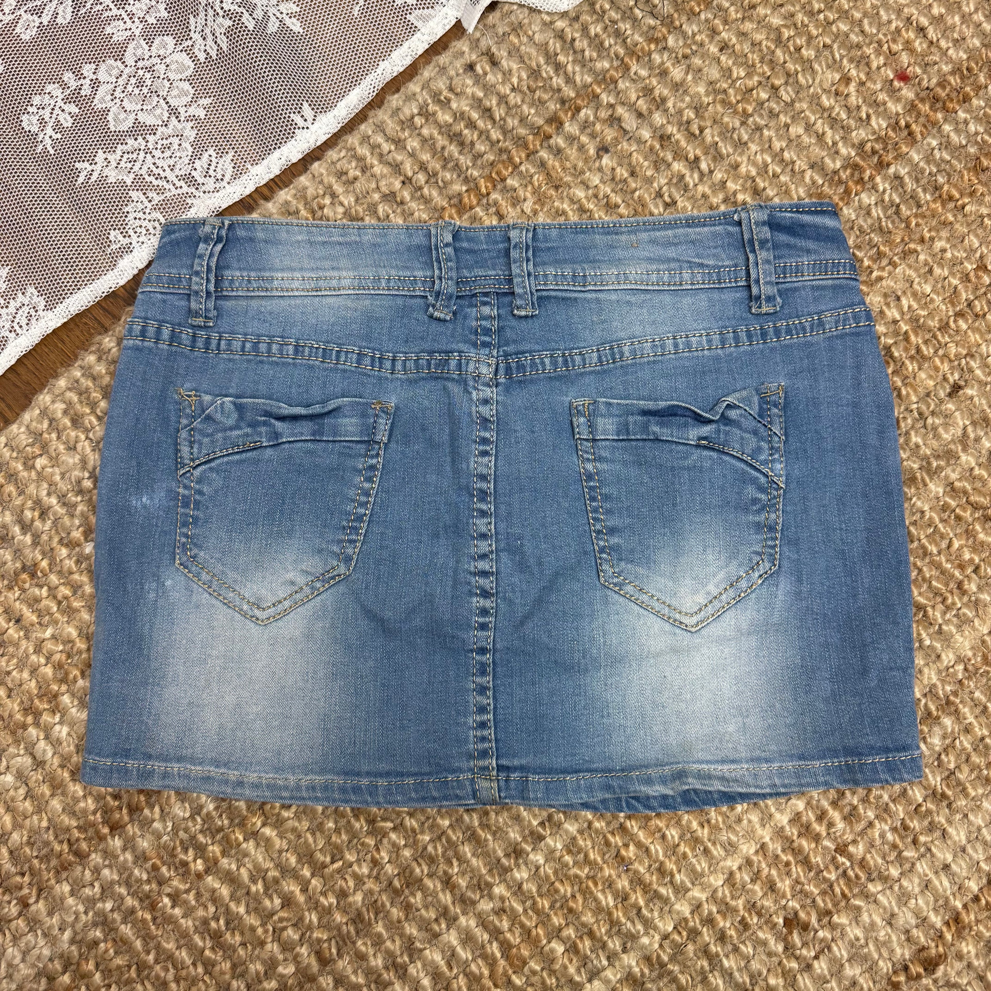 Mid washed denim blue stretchy mini skirt