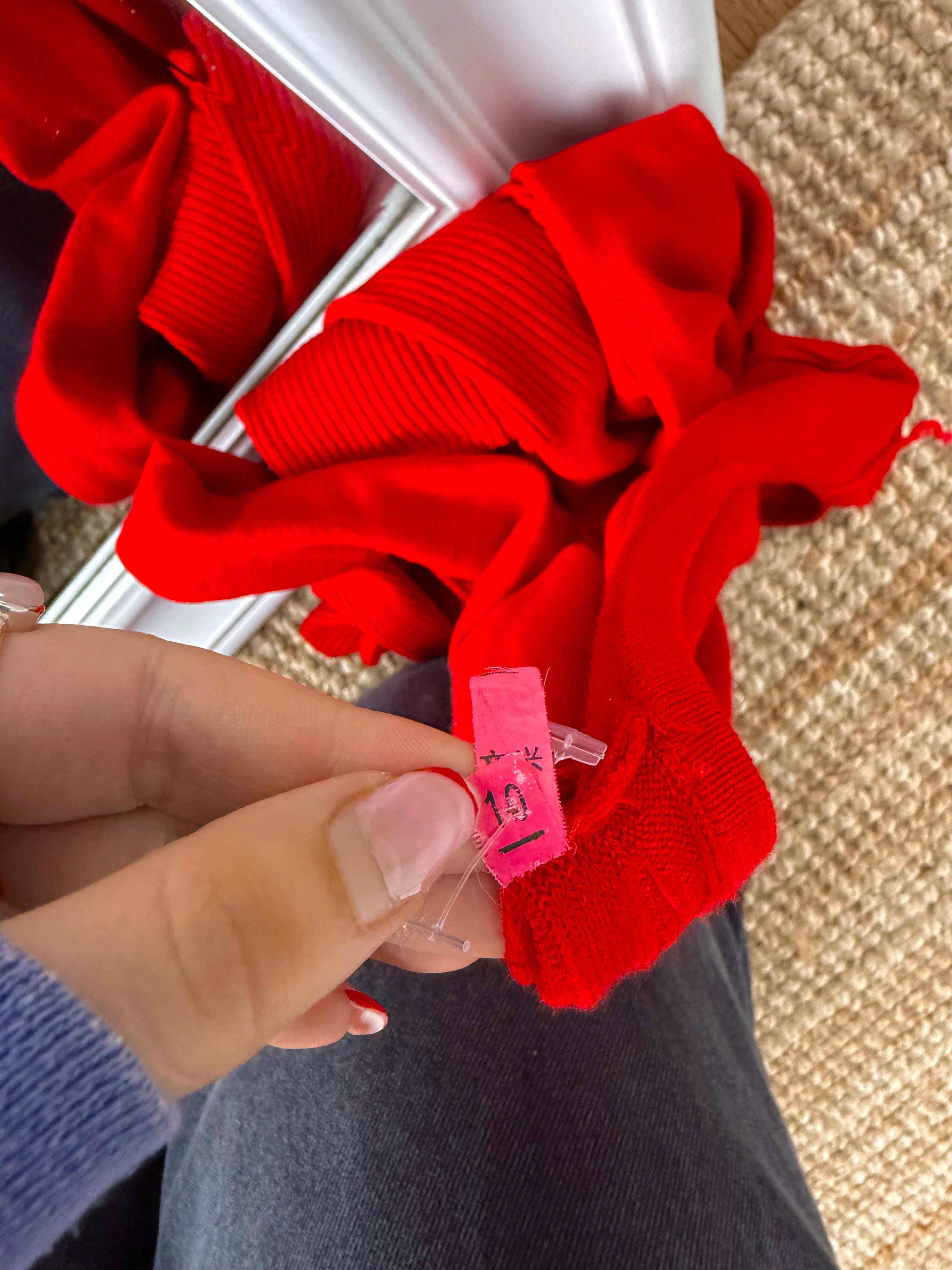 Red sequin off the shoulder buckle jumper