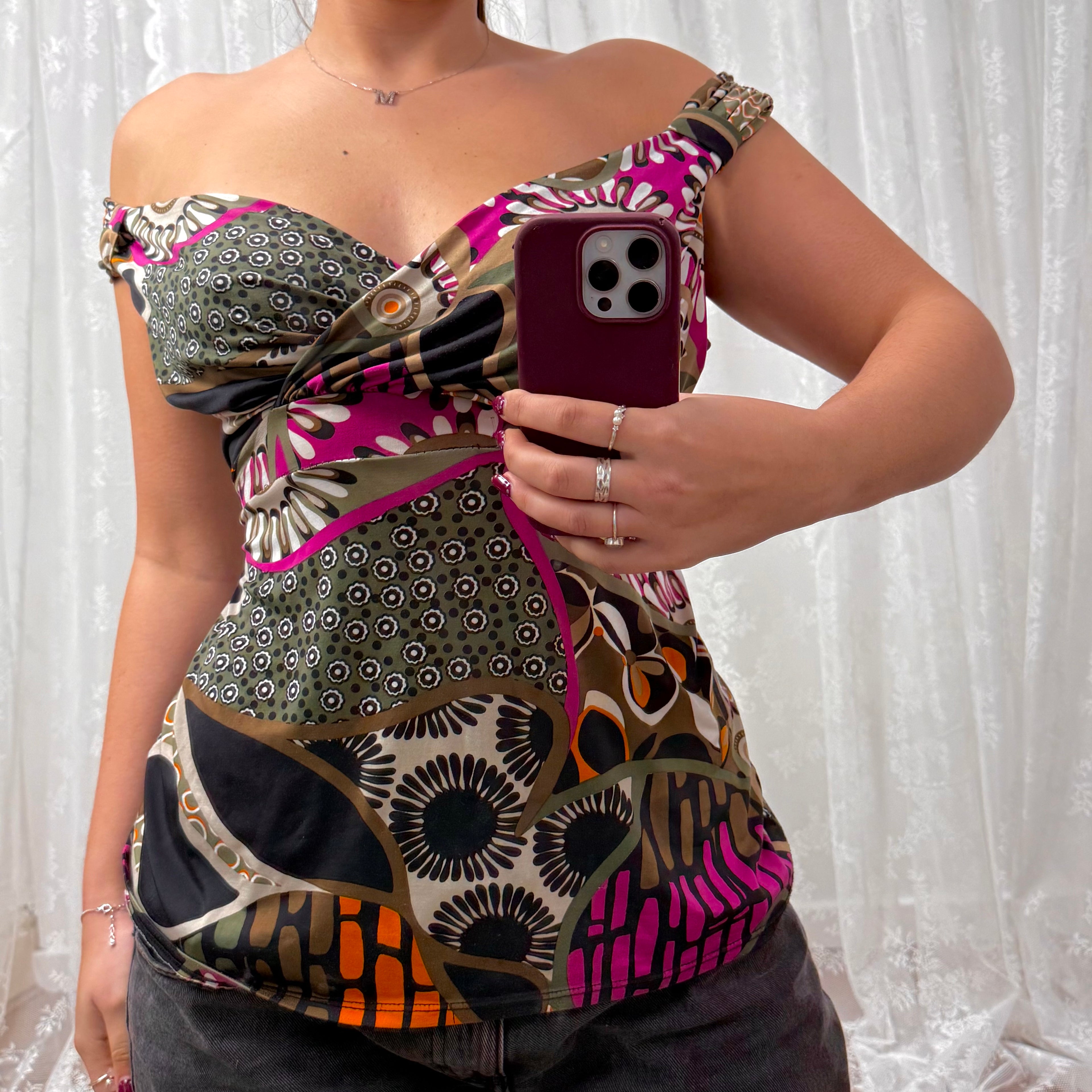 Green slinky patterned off the shoulder top