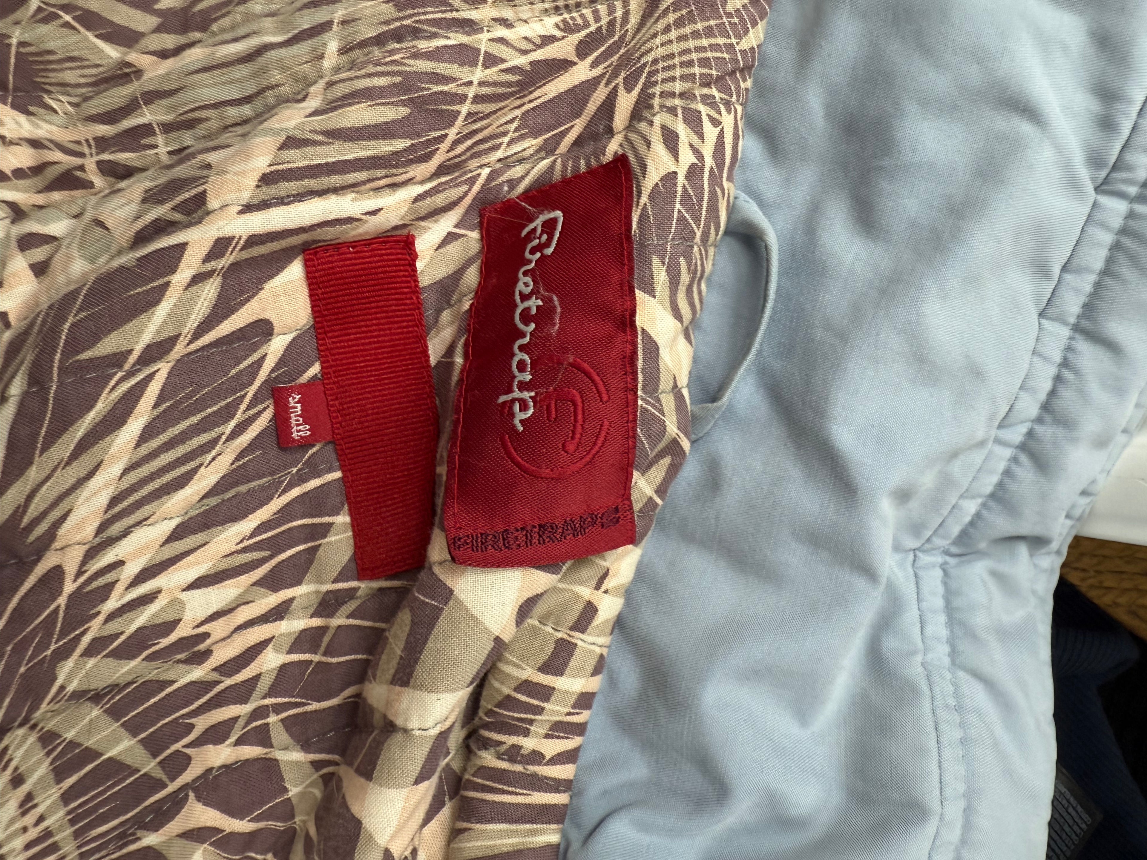 Blue padded cargo jacket with embroidered back