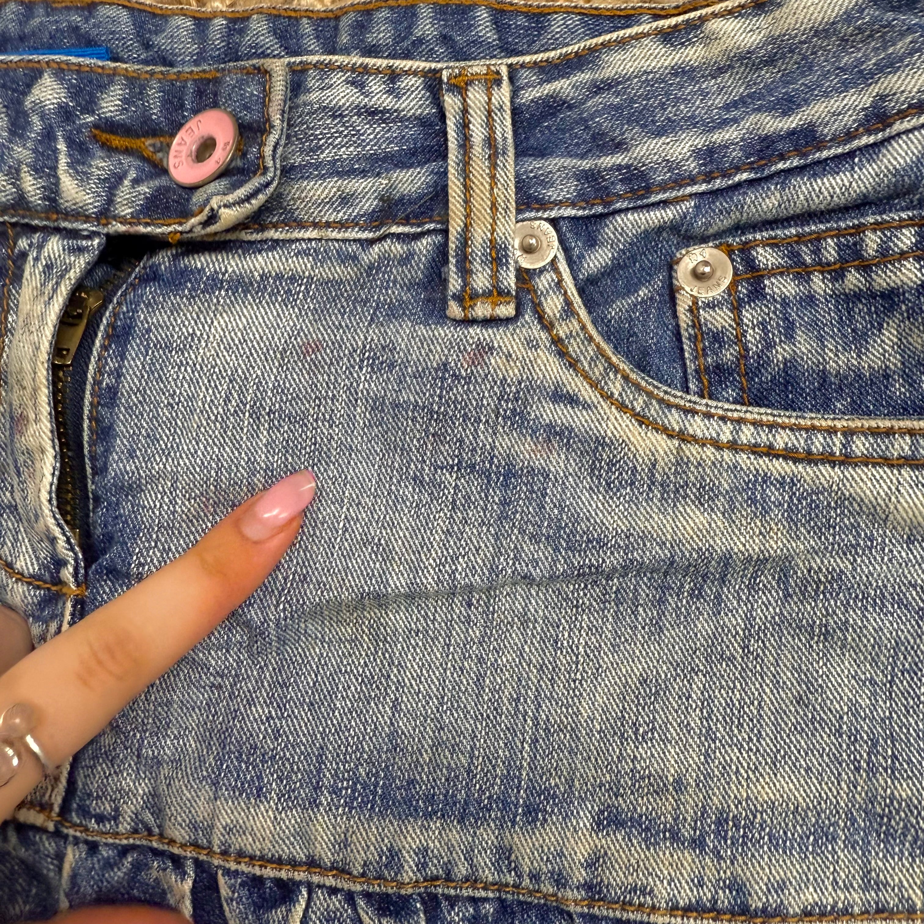 Blue denim low waisted ruffle mini skirt