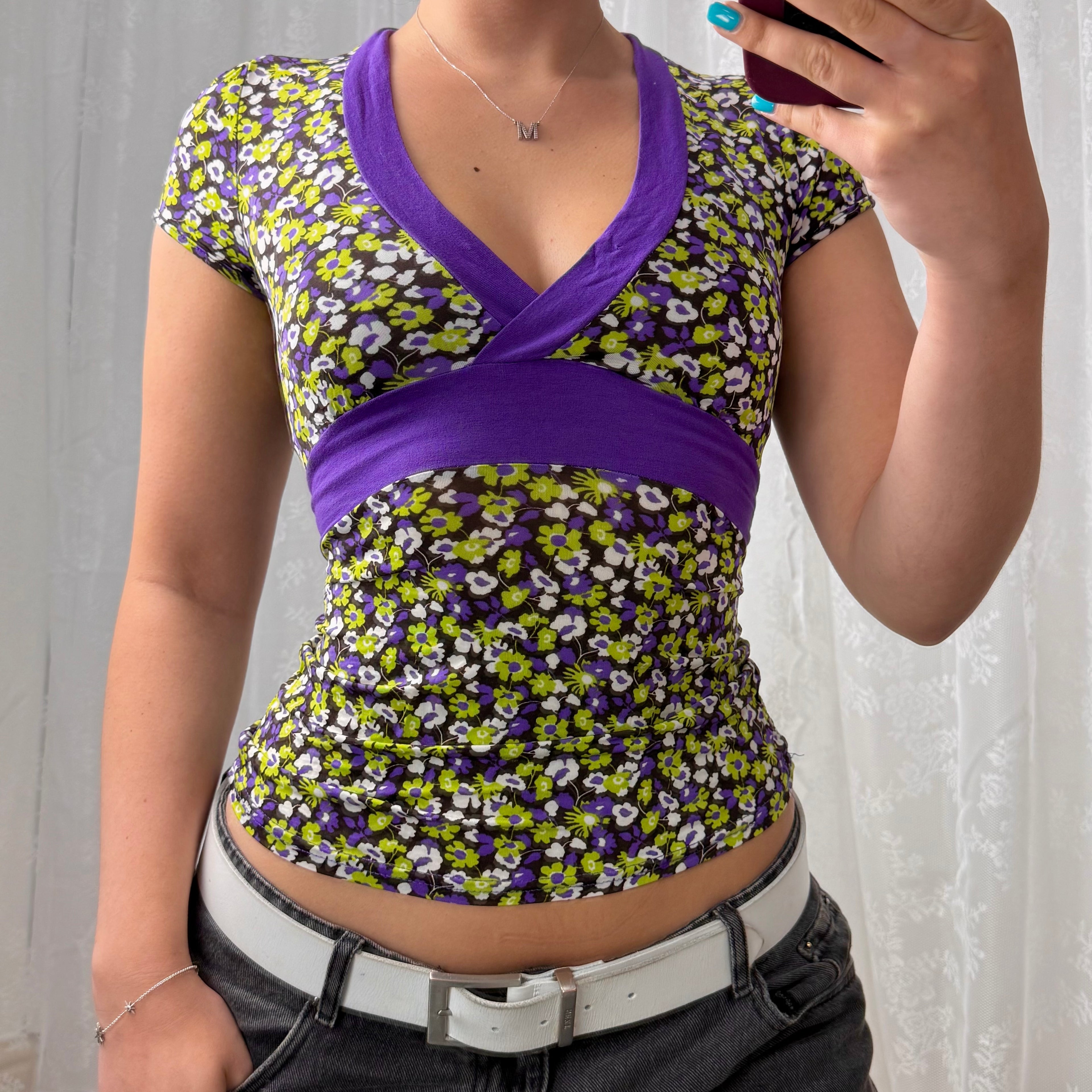 Purple and green slinky patterned top with tie back
