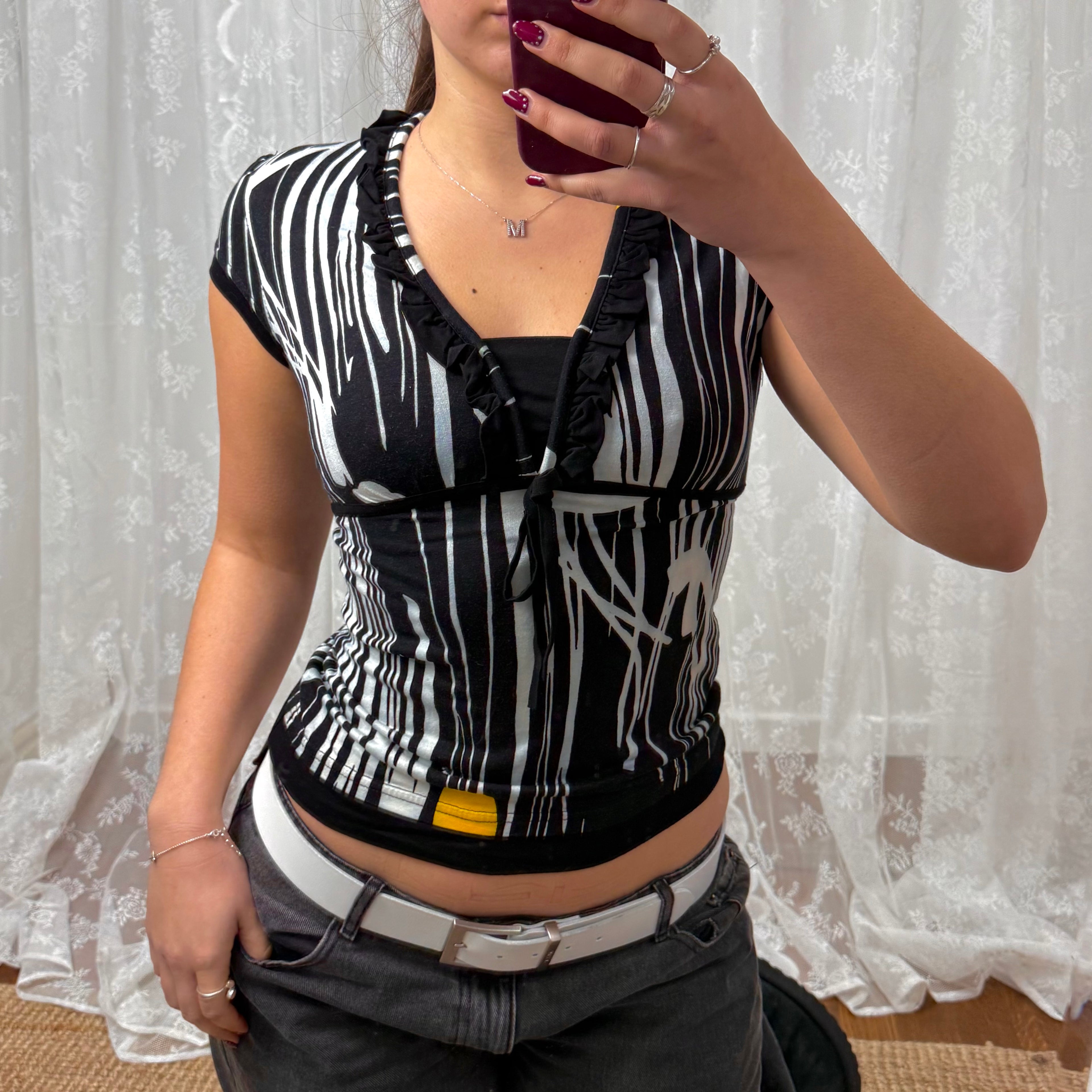 Black and white patterned top with tie back