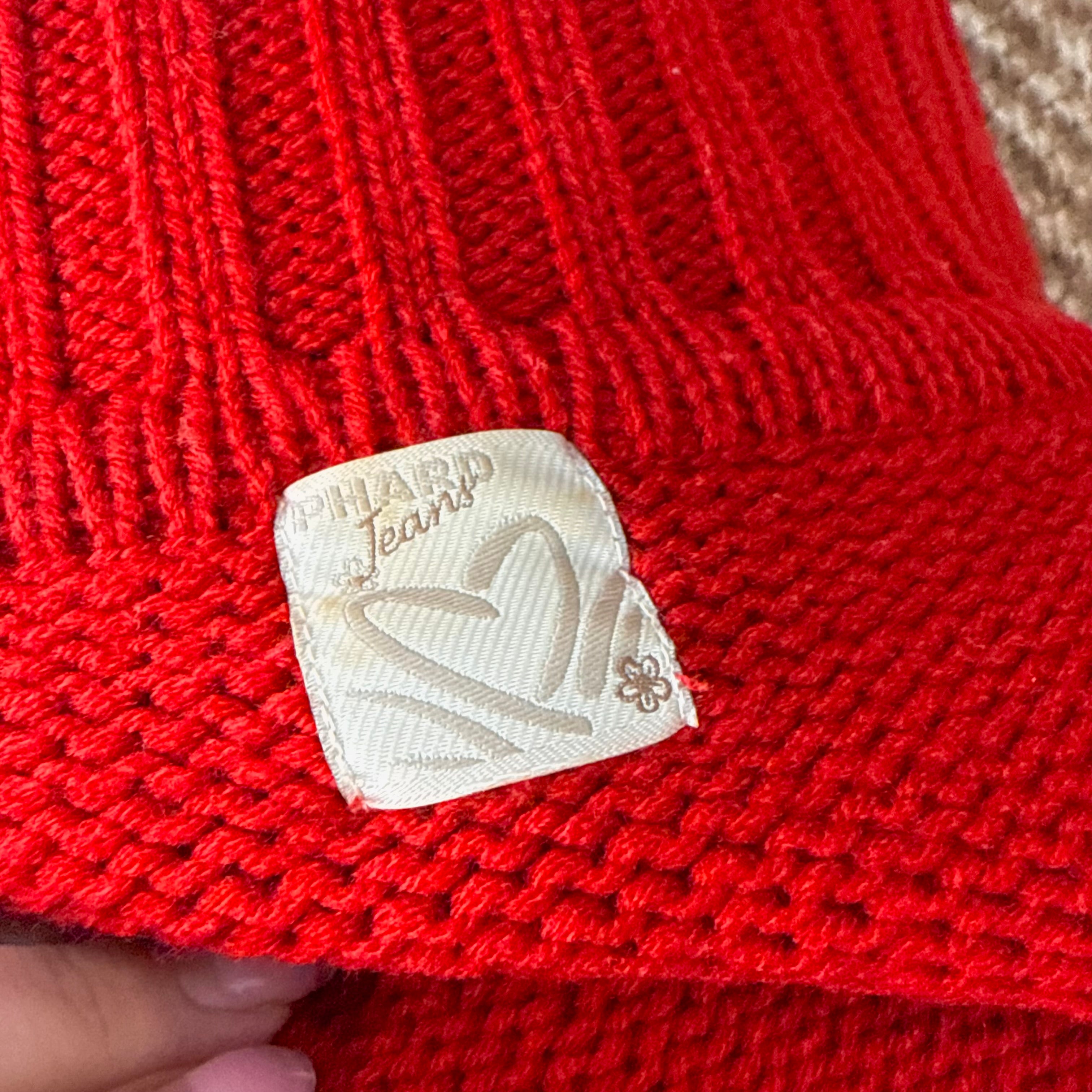Red knitted zip up sweater
