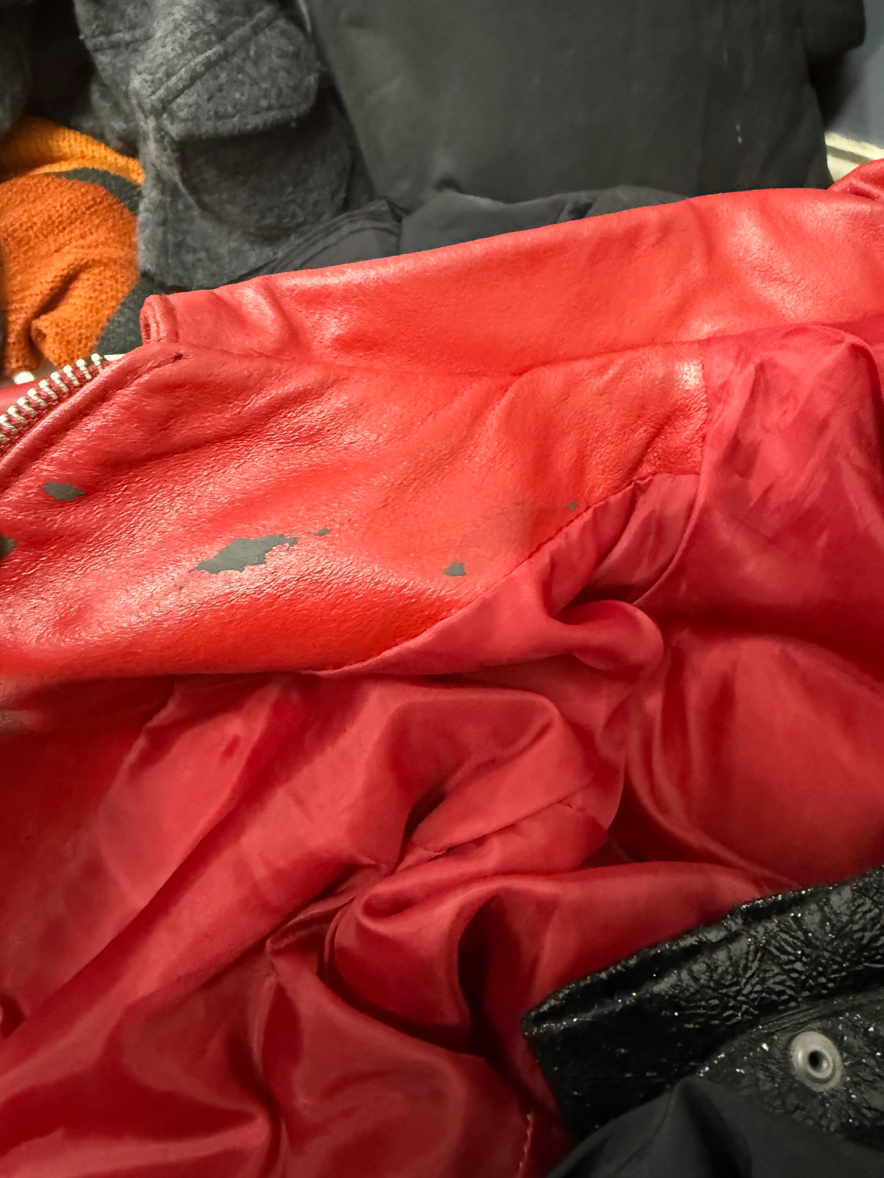 Red leather zip up collared jacket