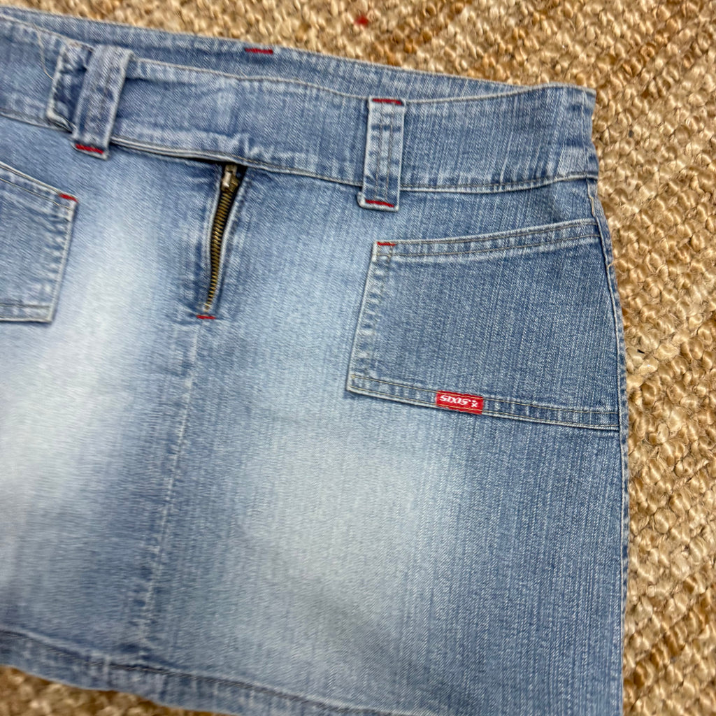 Light wash denim mini skirt with waistband detailing