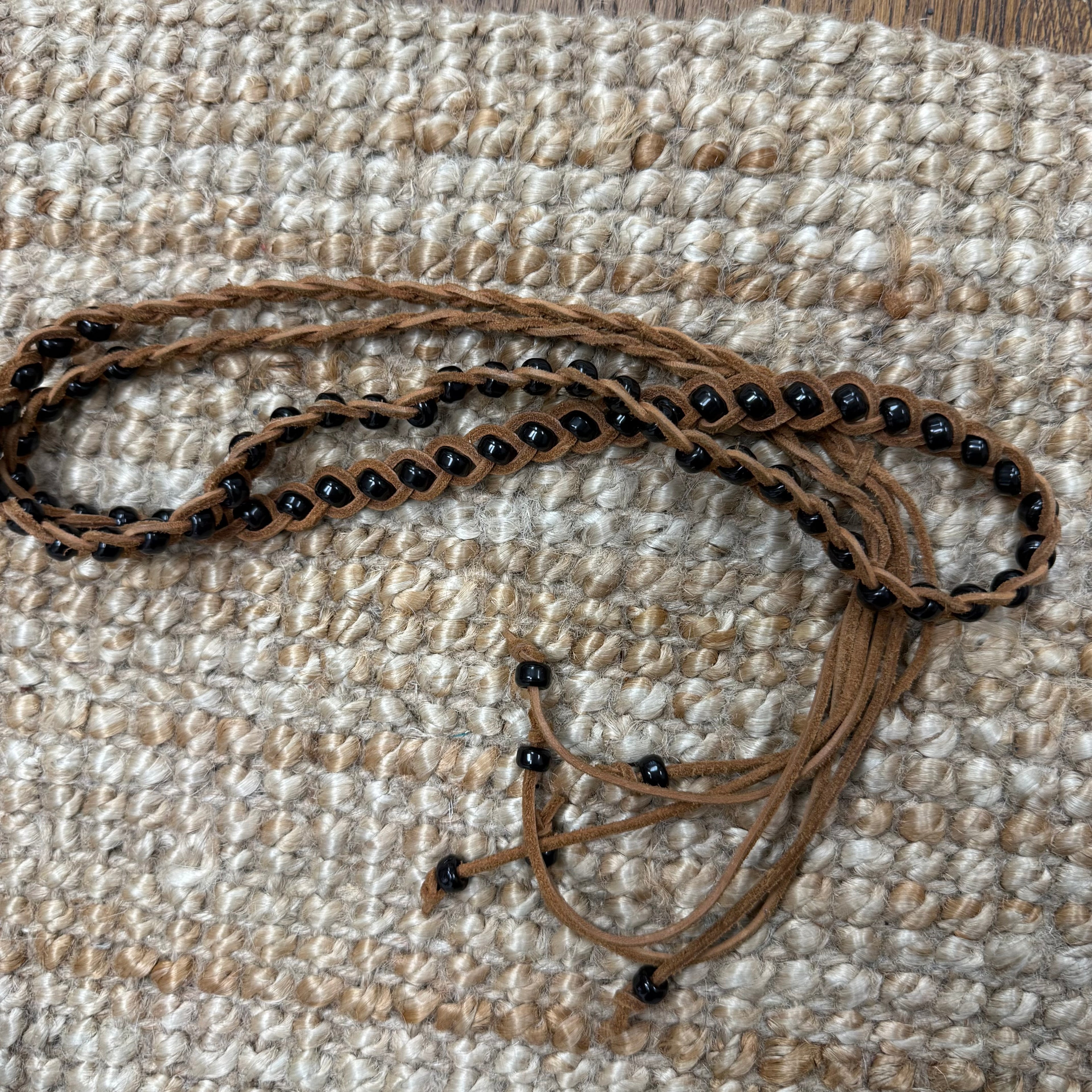 Brown and black beaded rope belt