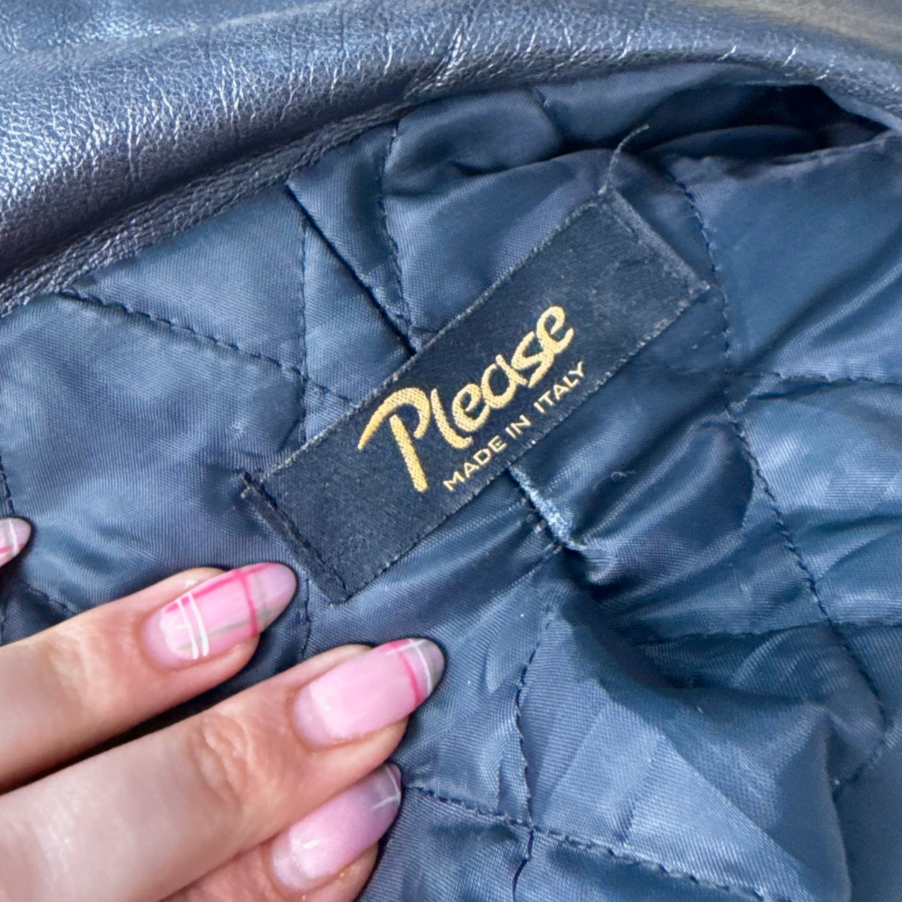 Black leather bomber jacket with zip detailing