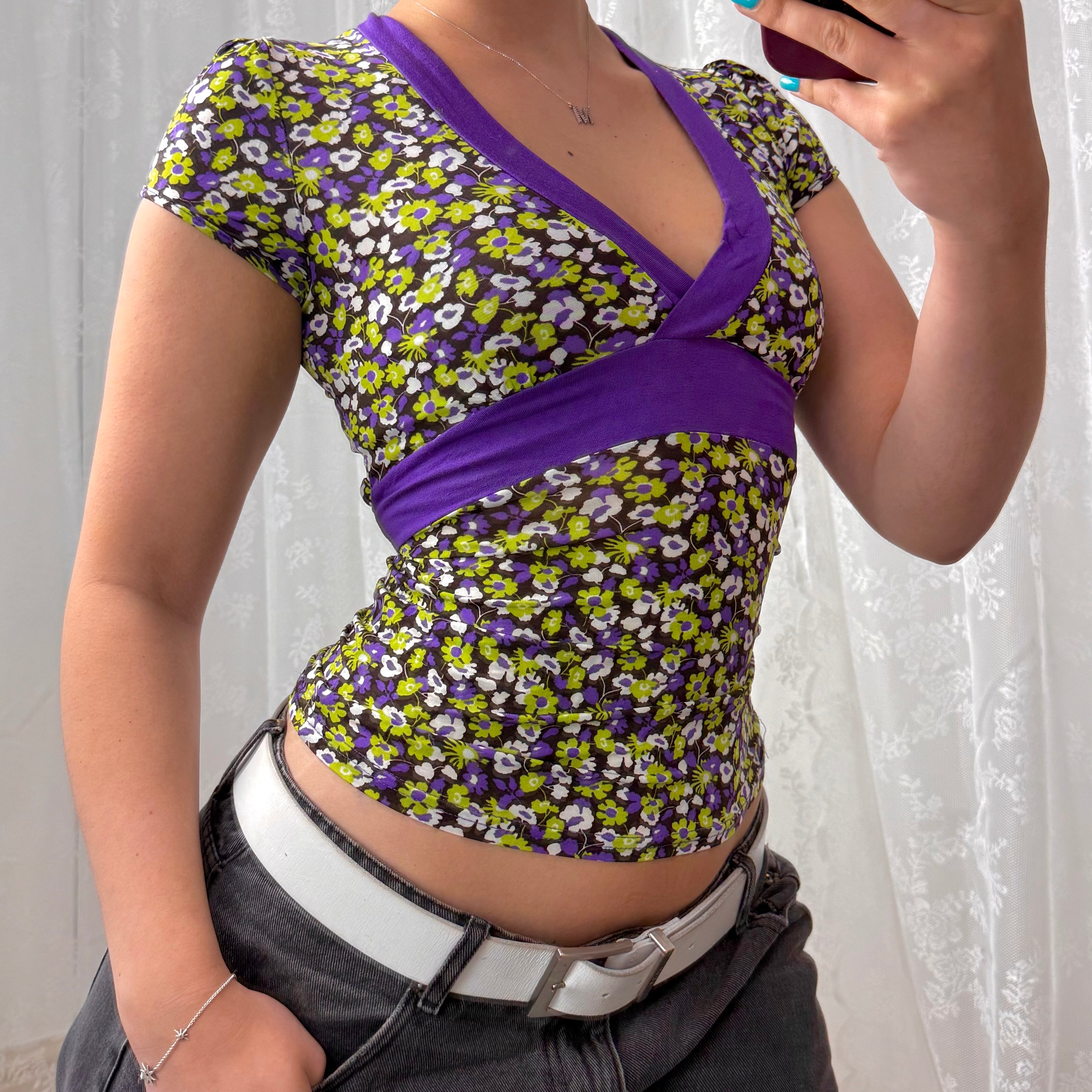 Purple and green slinky patterned top with tie back