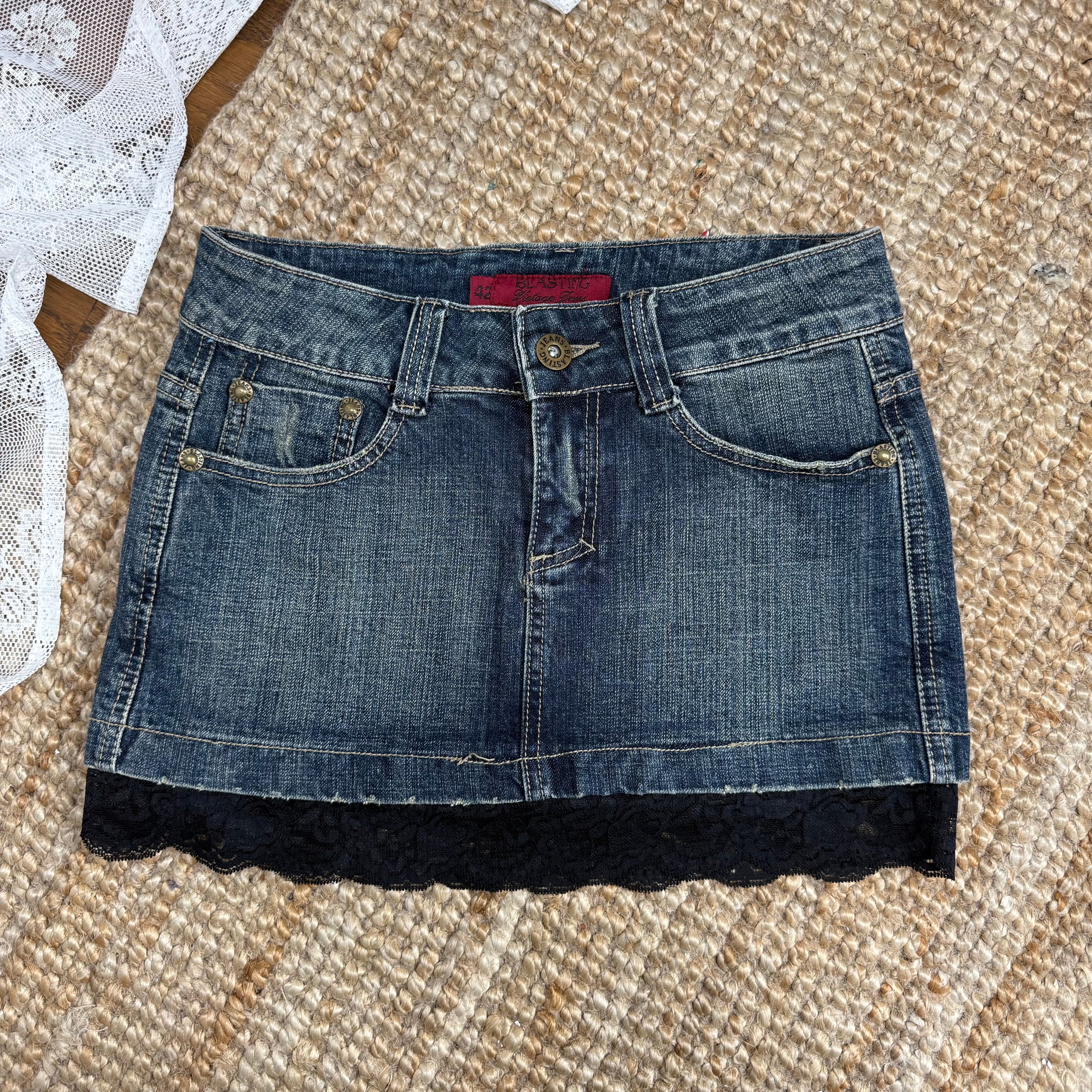 Blue denim mini skirt with black lace
