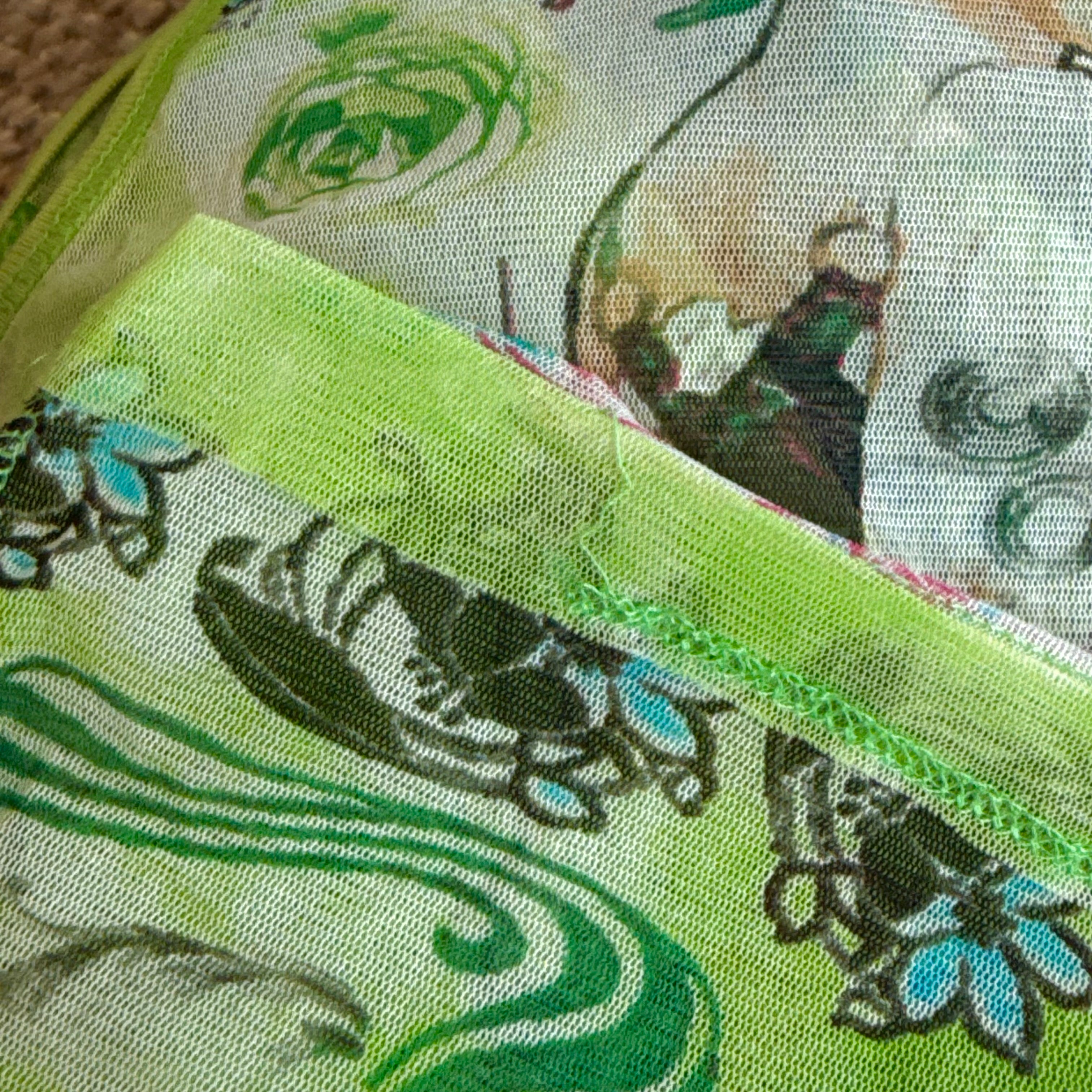 Green mesh patterned top