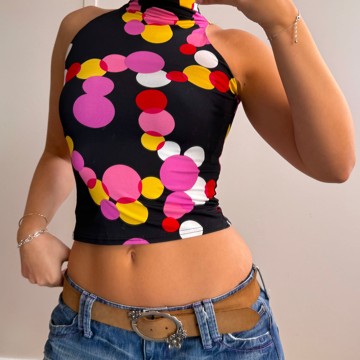 Black spotty turtleneck cropped top
