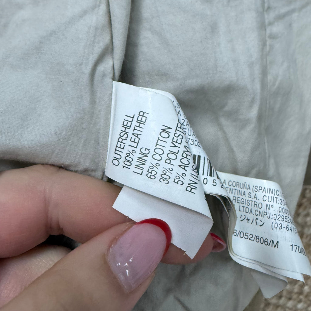 Beige leather bomber jacket