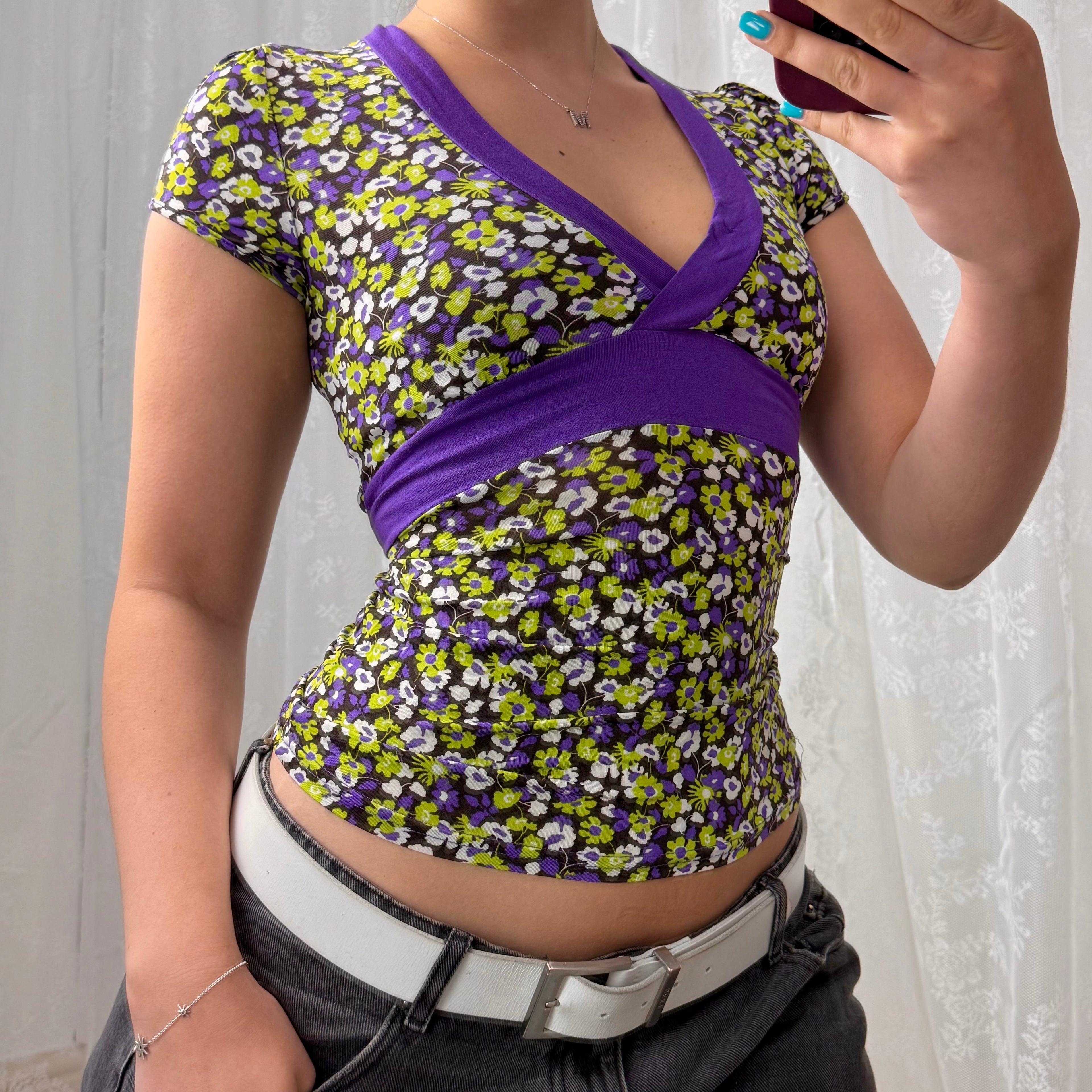Purple and green slinky patterned top with tie back