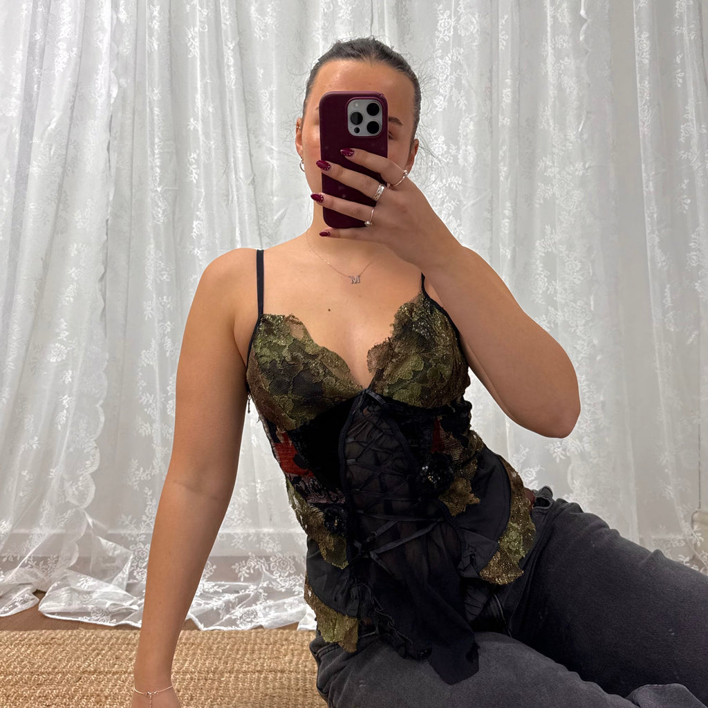 Black and green shiny corset style top