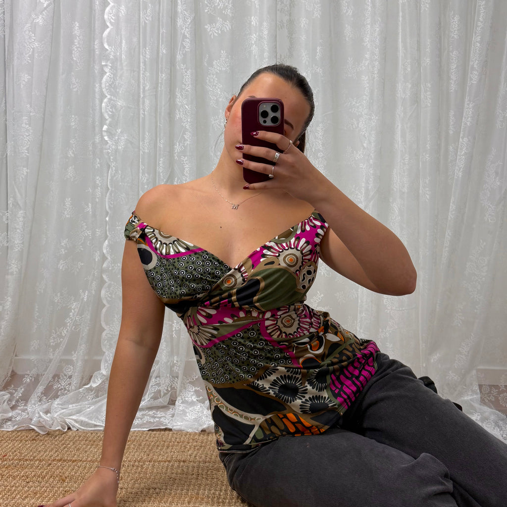 Green slinky patterned off the shoulder top