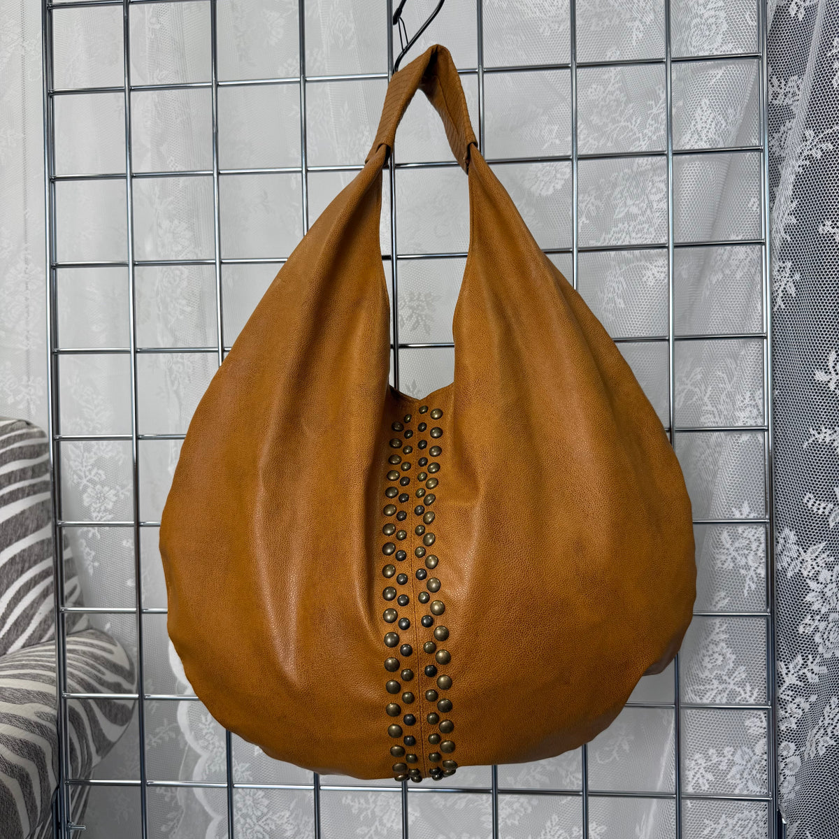 Brown studded large hobo bag