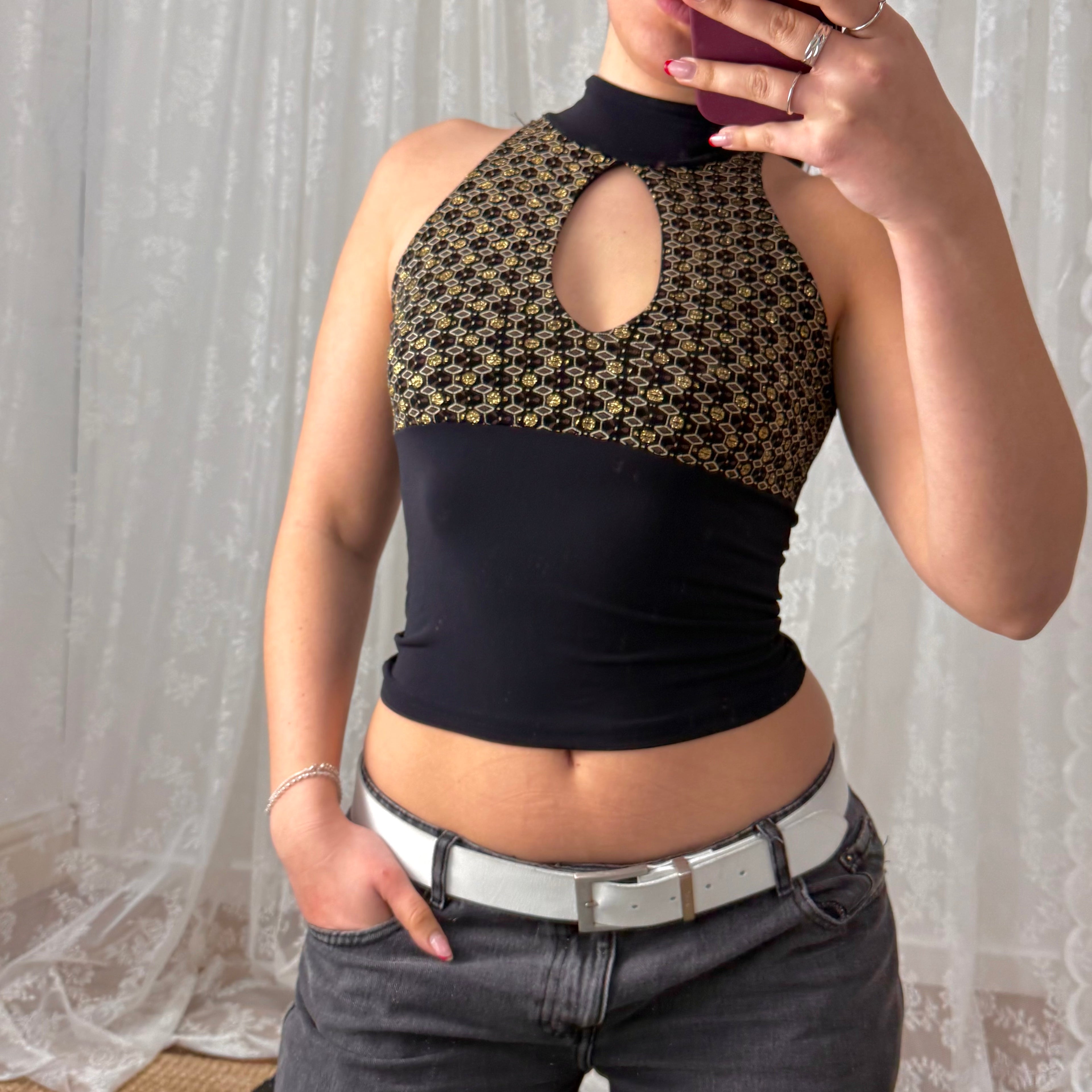 Black and gold glittery cut out top