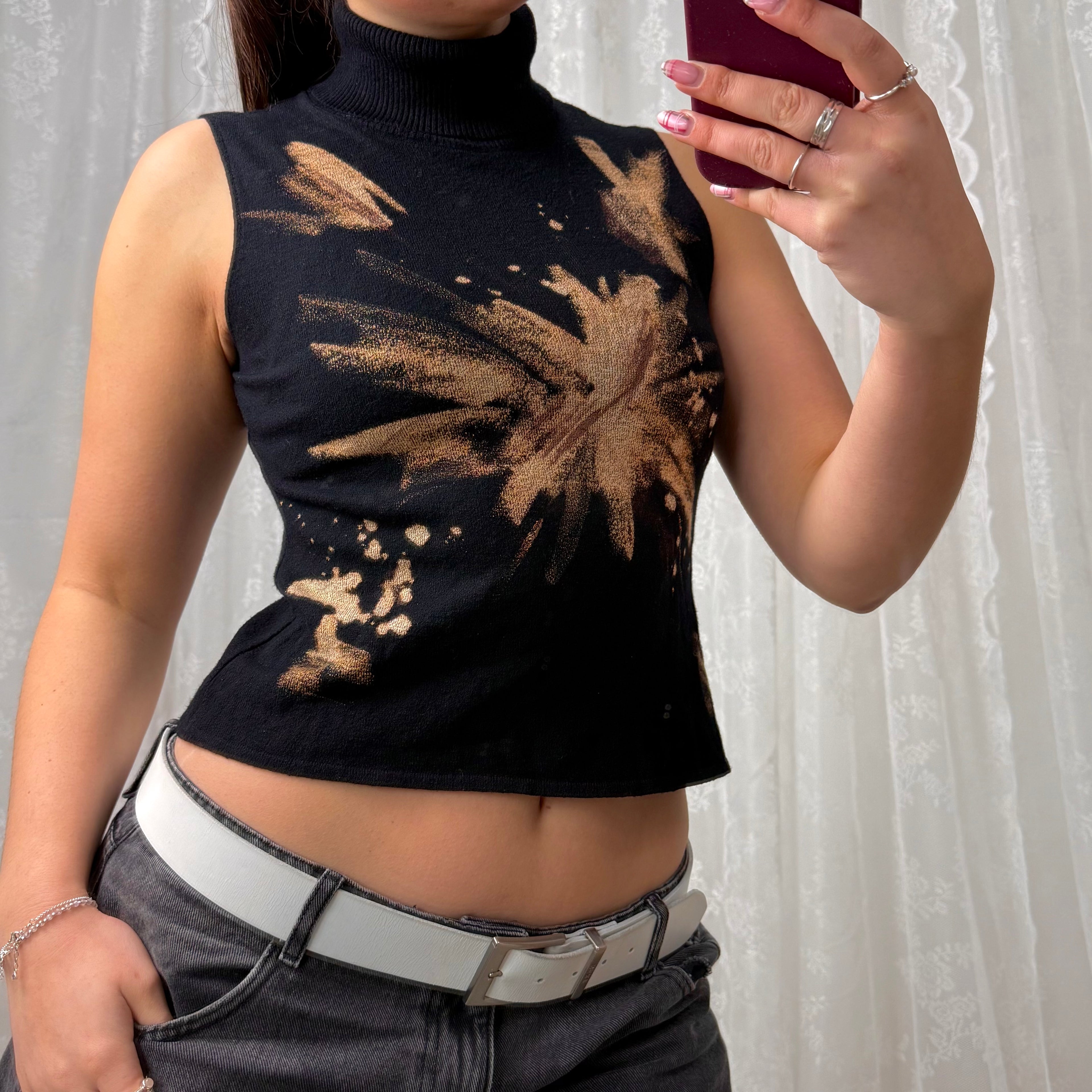 Black and brown patterned turtleneck