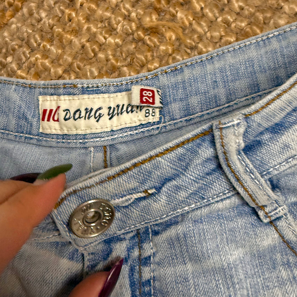 Blue denim shorts with embroidery detailing