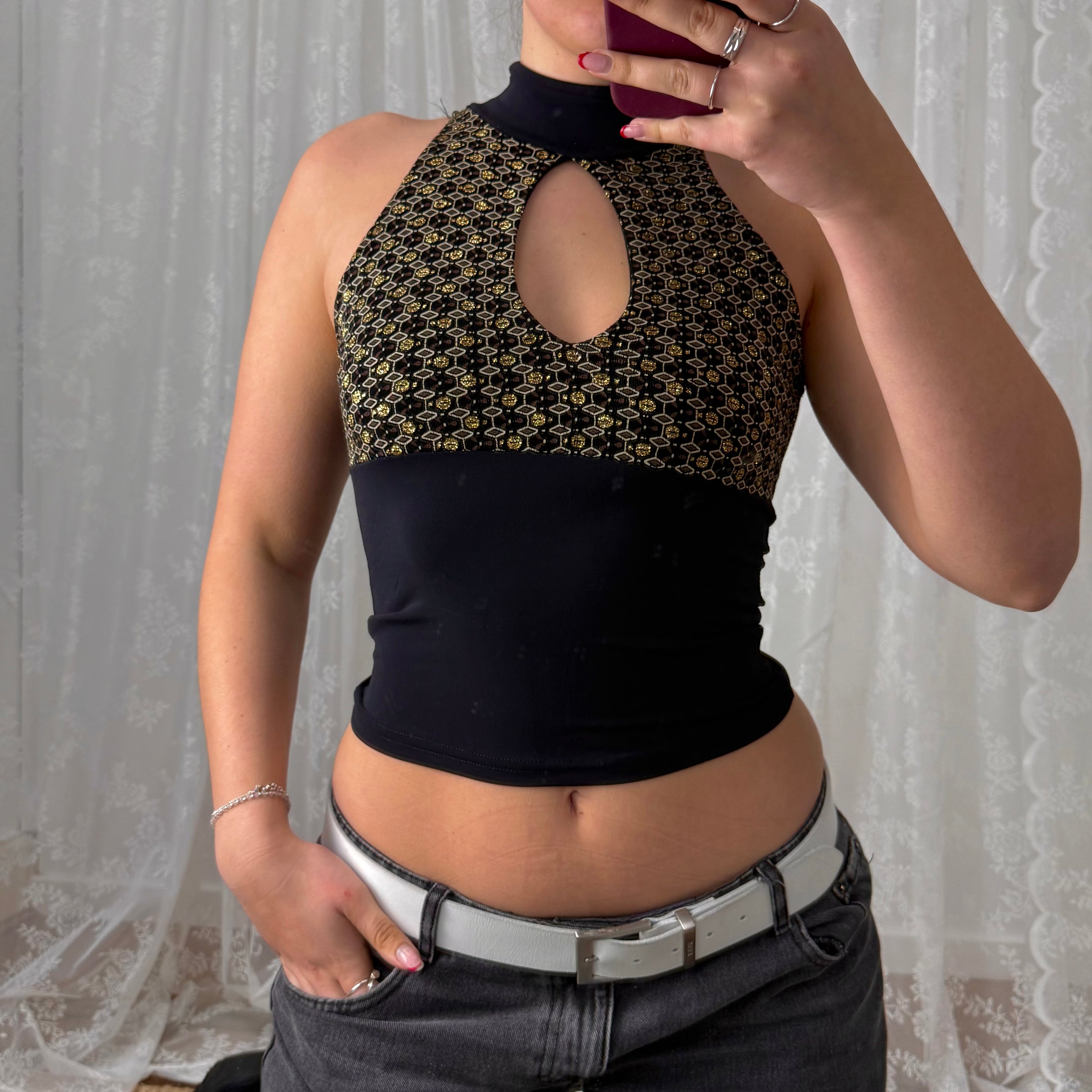 Black and gold glittery cut out top