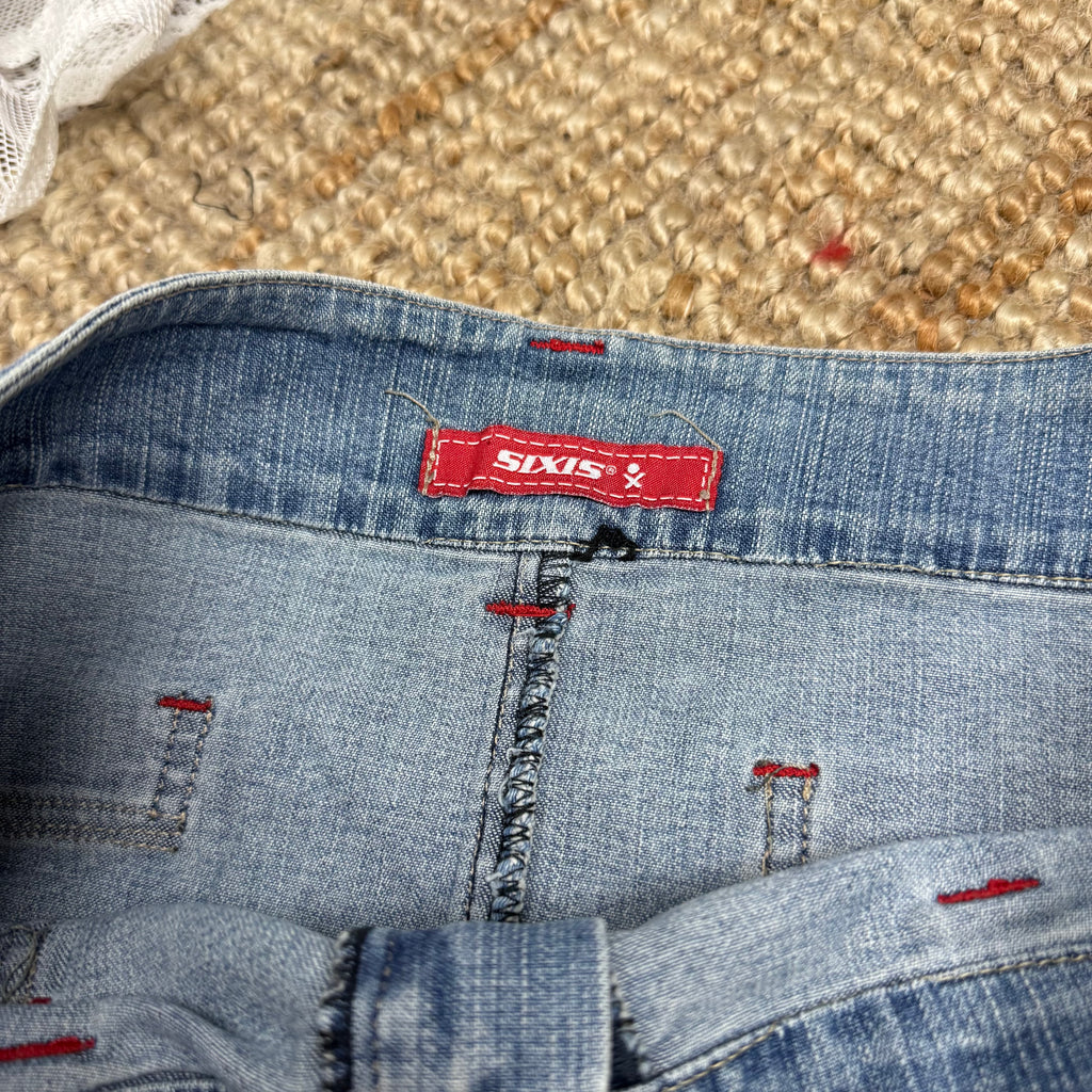 Light wash denim mini skirt with waistband detailing