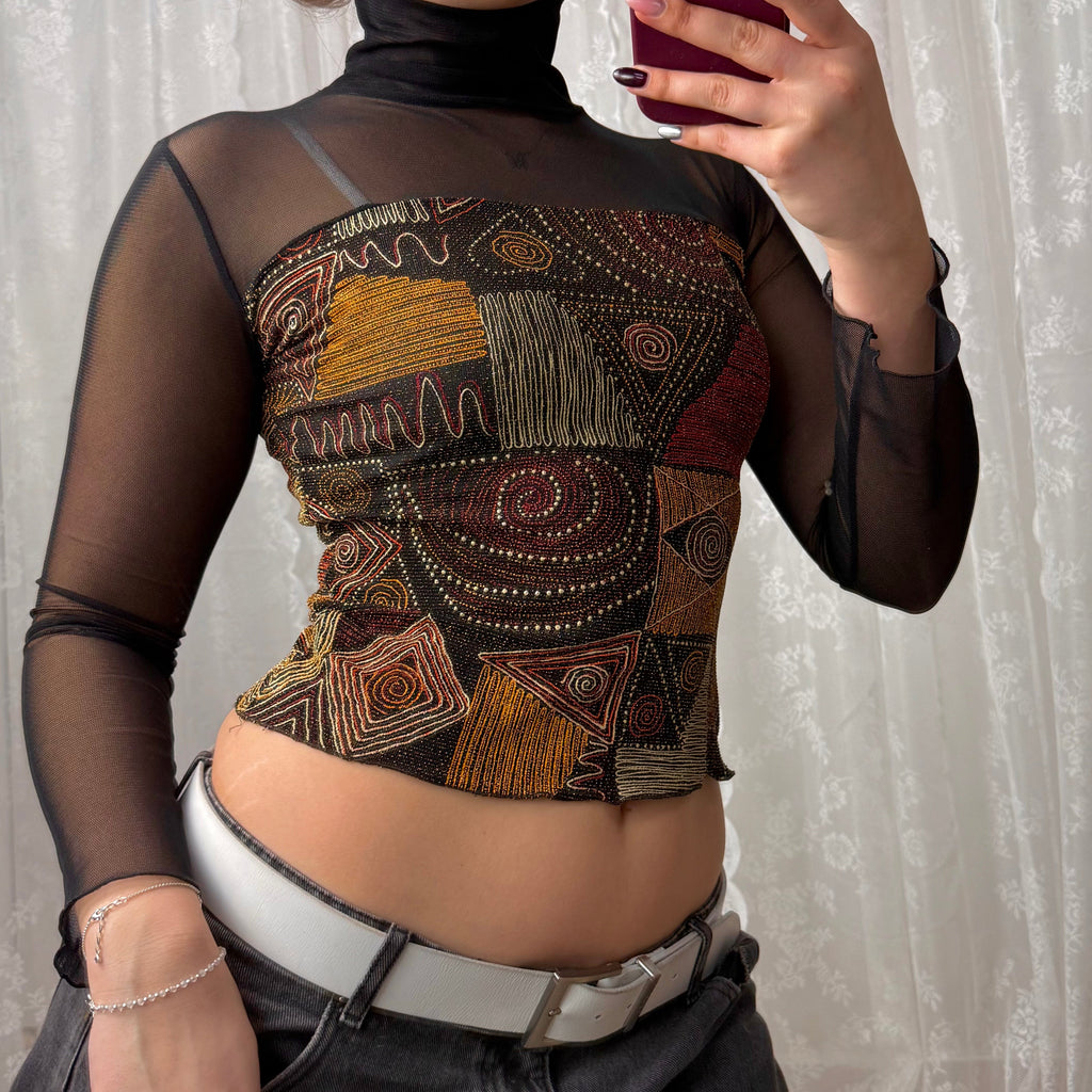Black mesh long sleeved turtleneck with glittery pattern