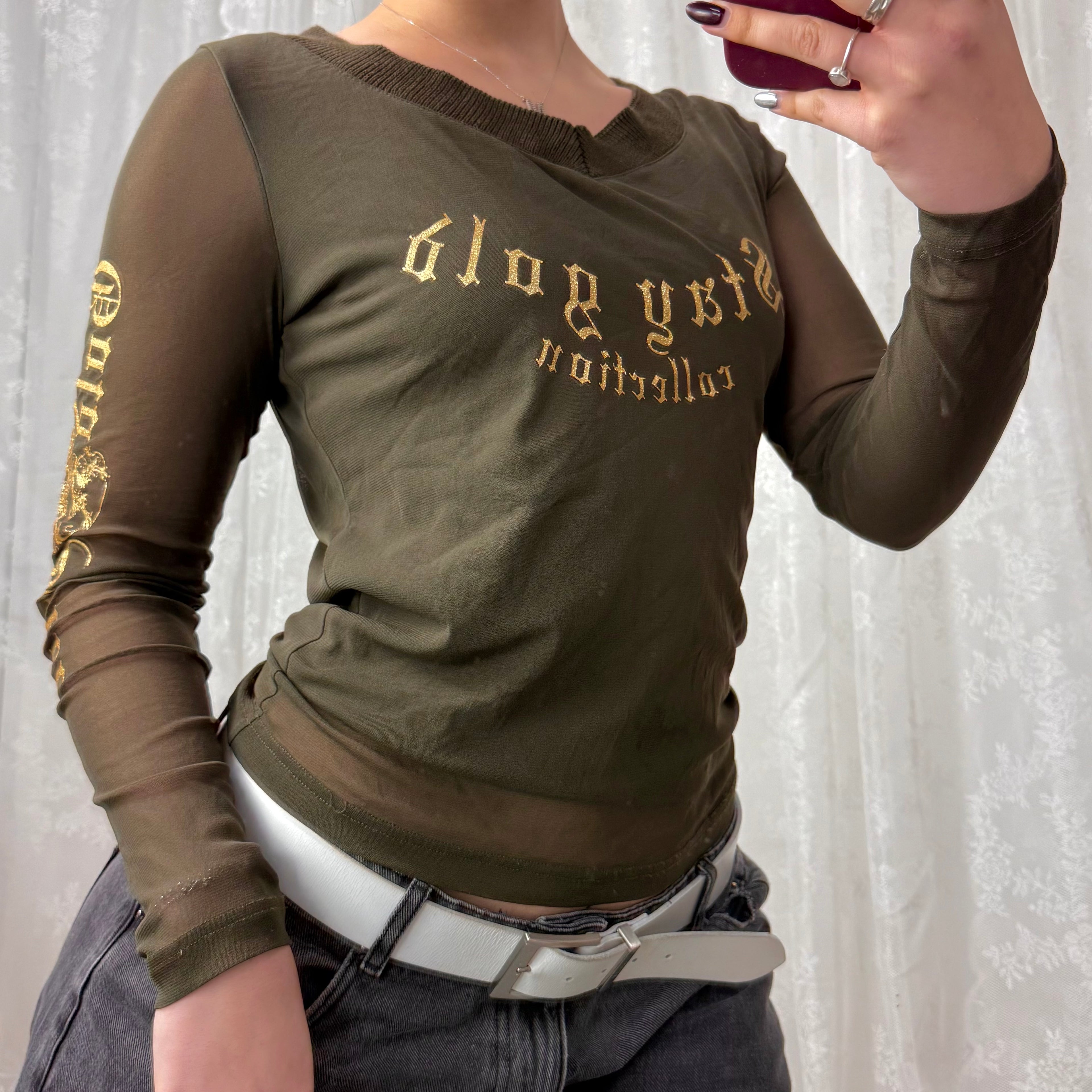 Green v neck long sleeved with gold detailing