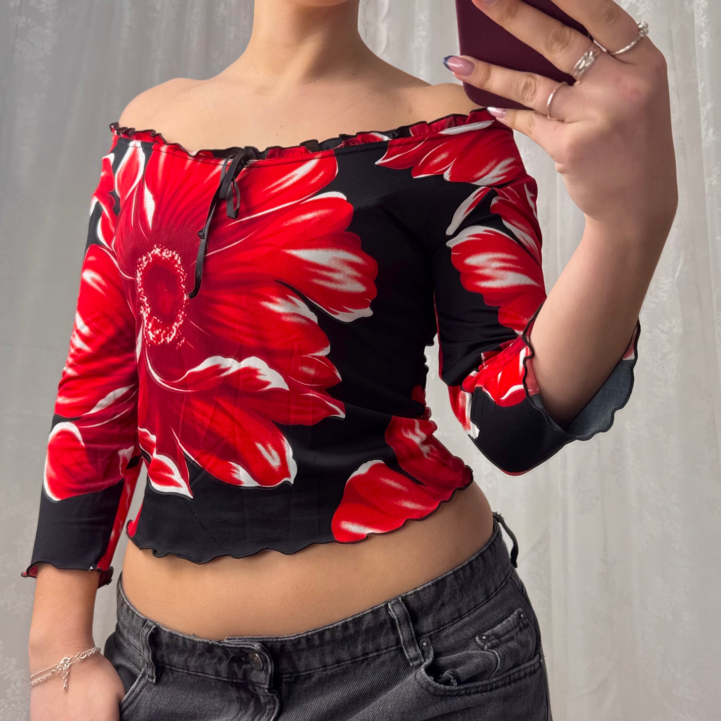Red and black patterned off the shoulder top