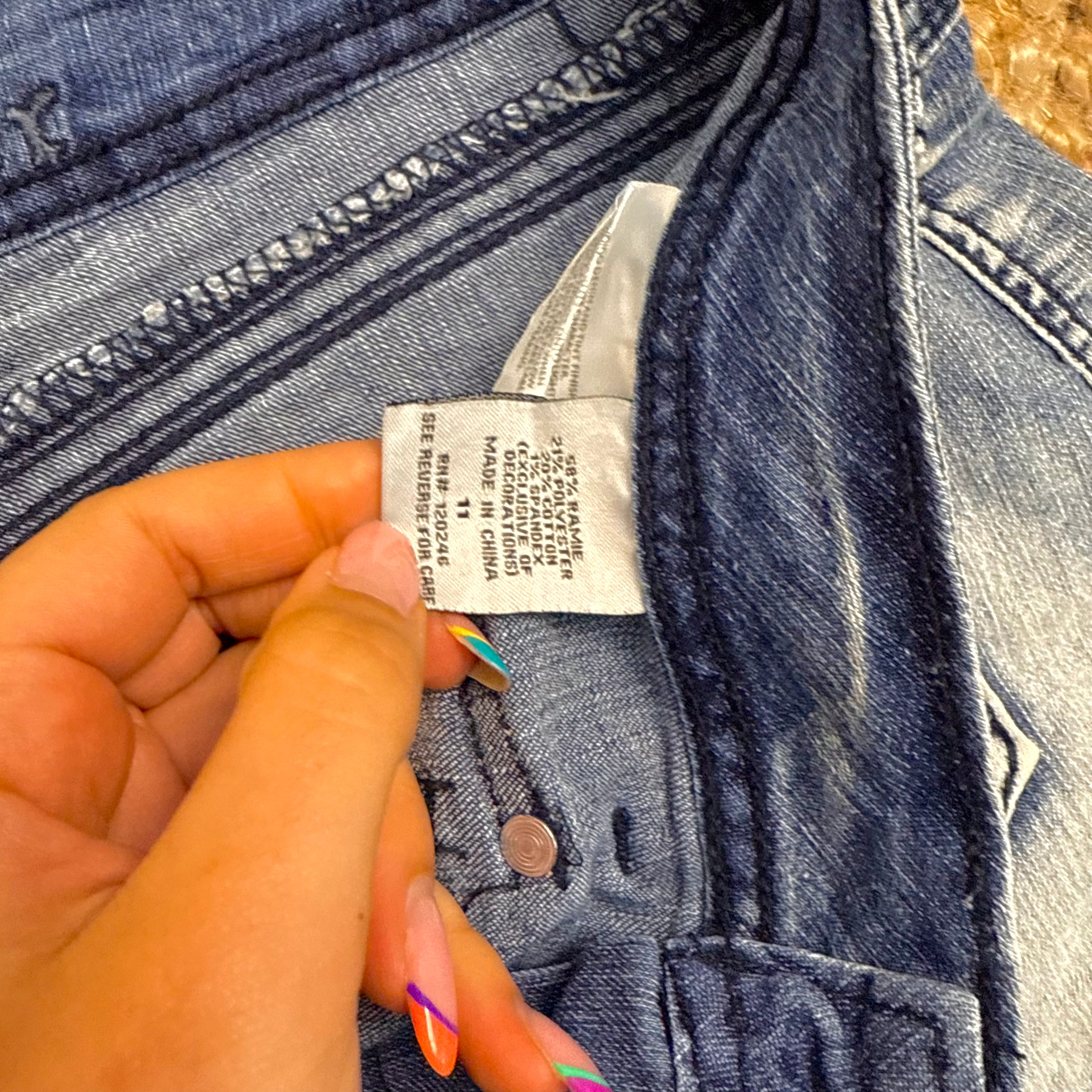 Blue denim studded mini shorts