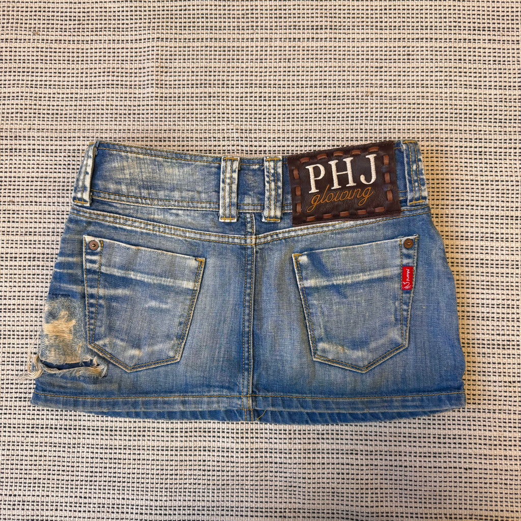 Blue denim distressed stuffed mini skirt