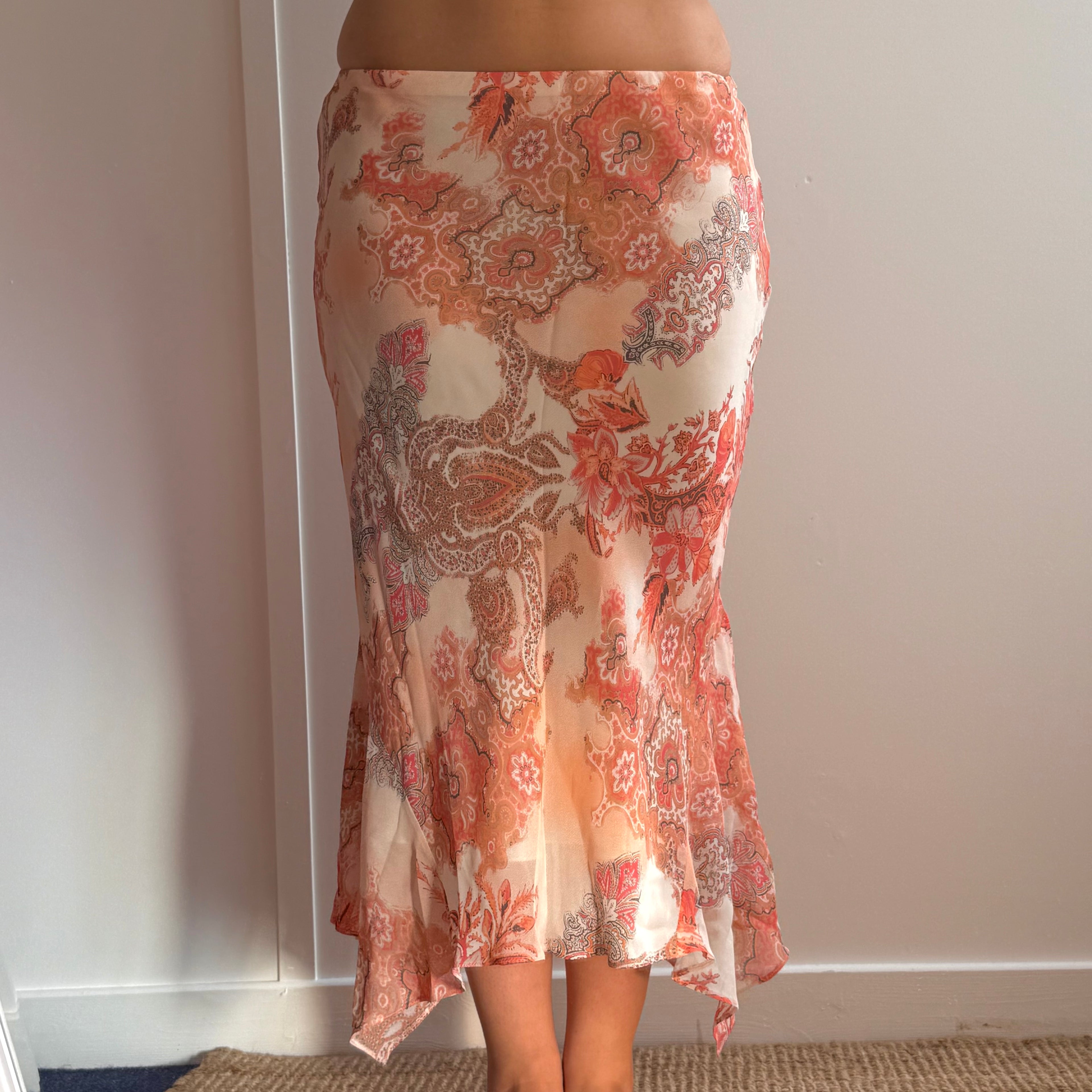Orange paisley patterned mesh midi skirt