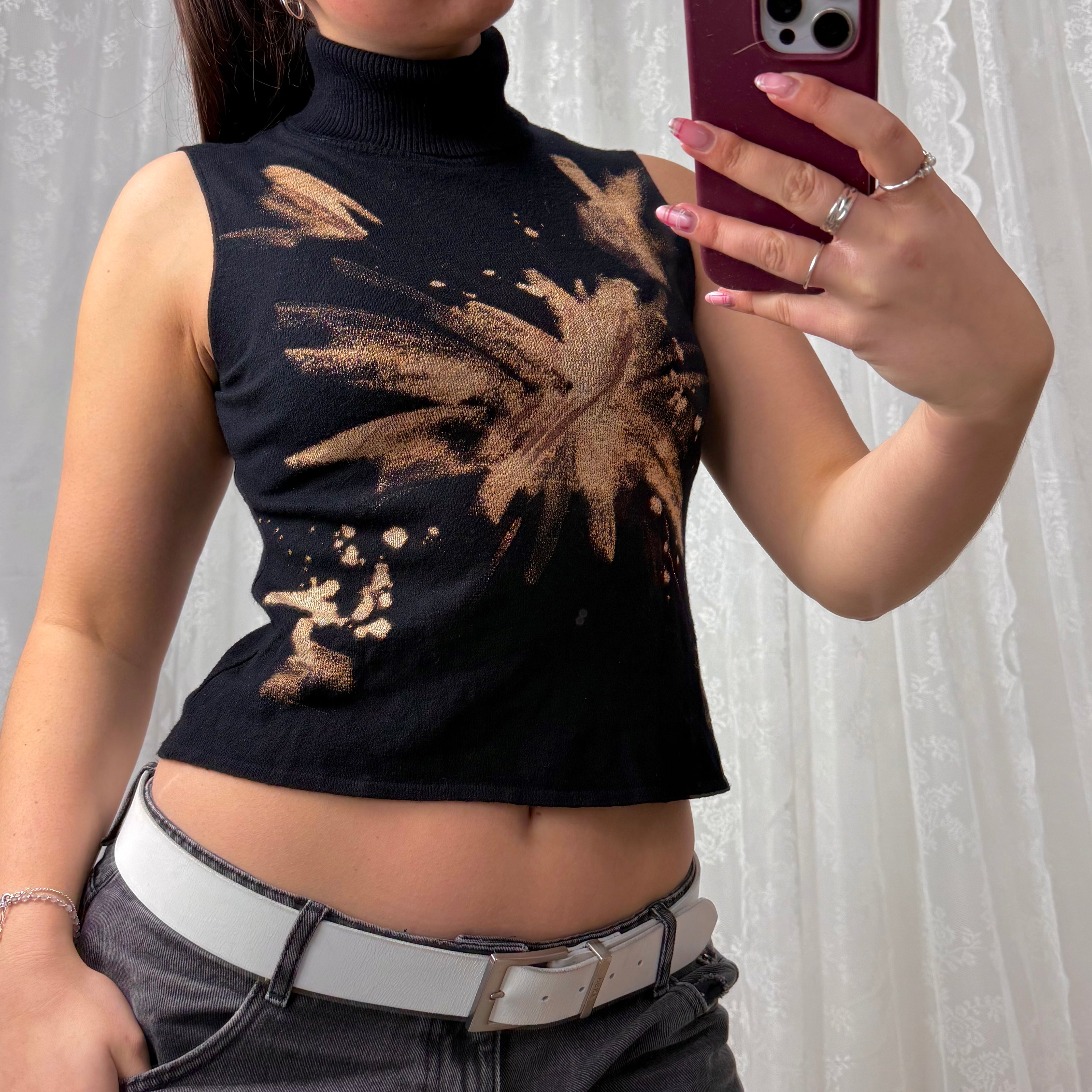 Black and brown patterned turtleneck